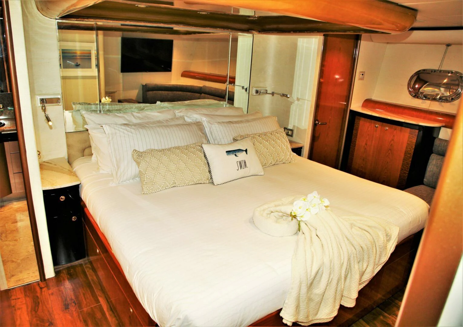 a bed with white sheets and pillows aboard CHASER - BEING OFFERED ON A 50% PARTNERSHIP BASIS Yacht for Sale