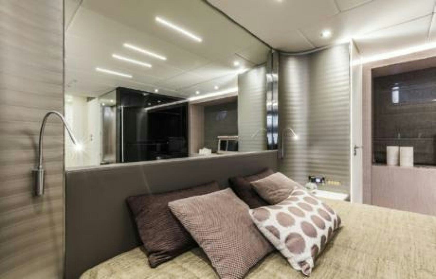 a couch in a room aboard OCEANIC 76' GT Yacht for Sale