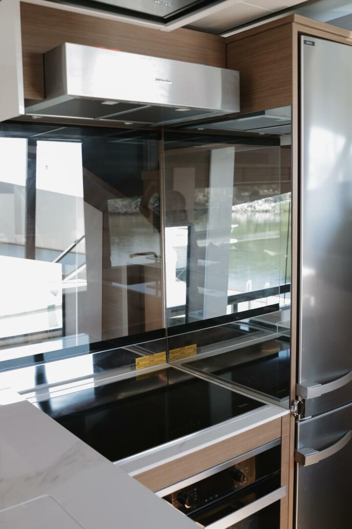 a glass case with a door aboard IL DISFRUTE Yacht for Sale