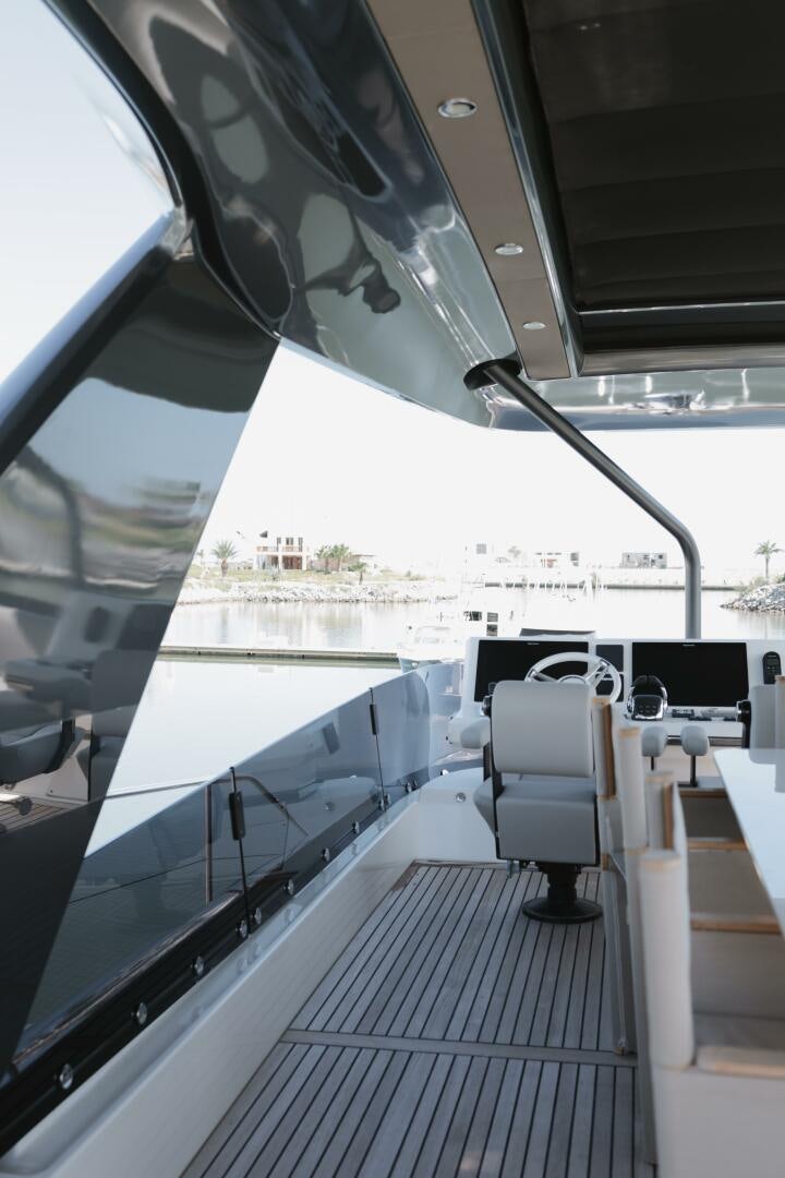 inside of a vehicle with a view of the water and a city aboard IL DISFRUTE Yacht for Sale