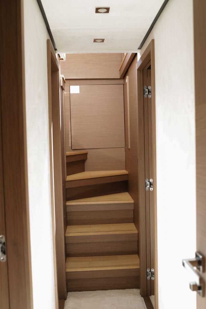 a wooden door with a wooden frame aboard IL DISFRUTE Yacht for Sale