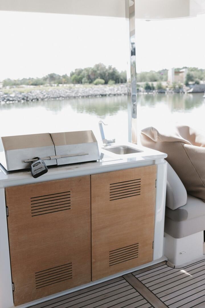 a sink with a sink and a window aboard IL DISFRUTE Yacht for Sale