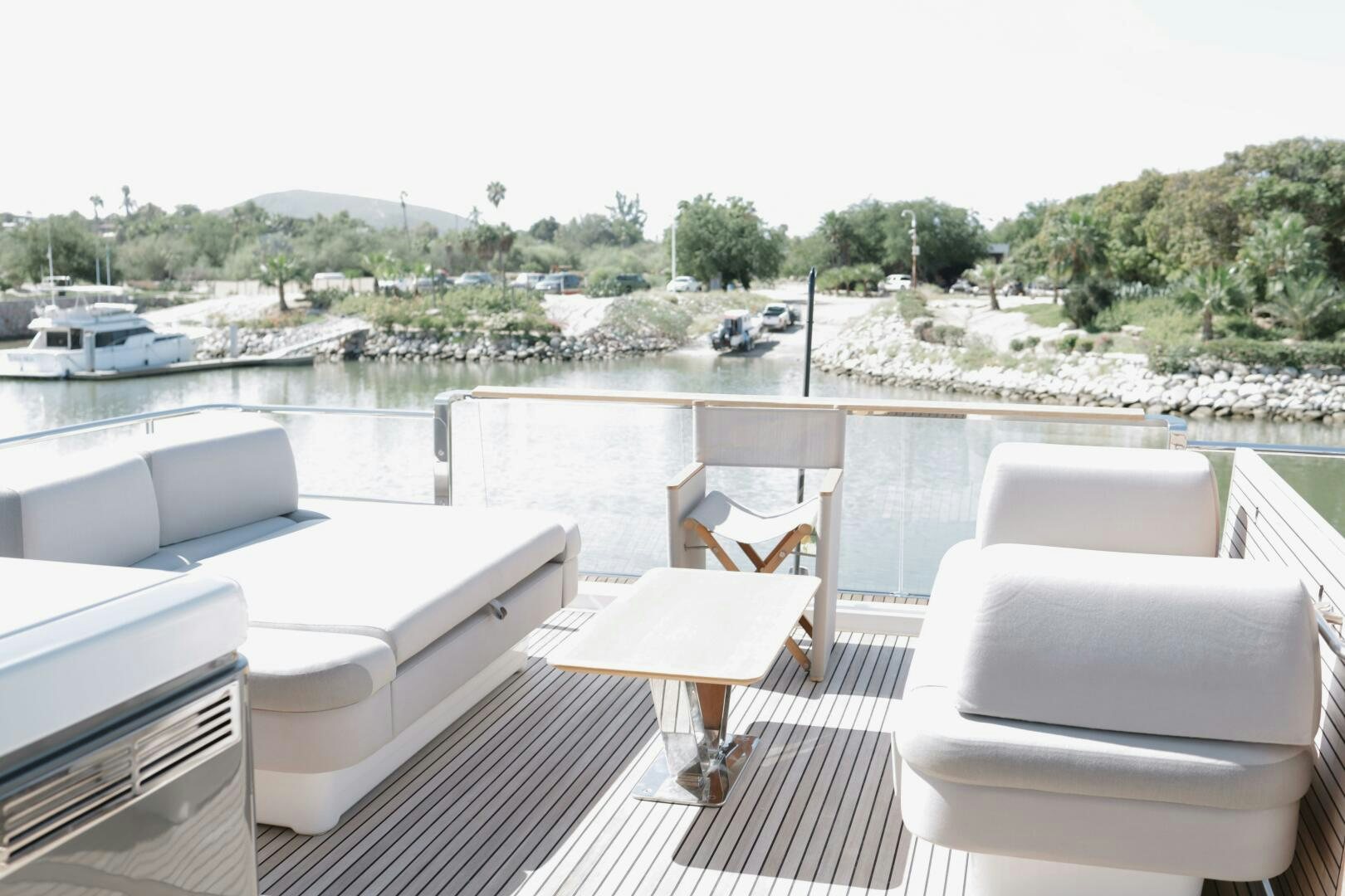 a room with a table and chairs aboard IL DISFRUTE Yacht for Sale