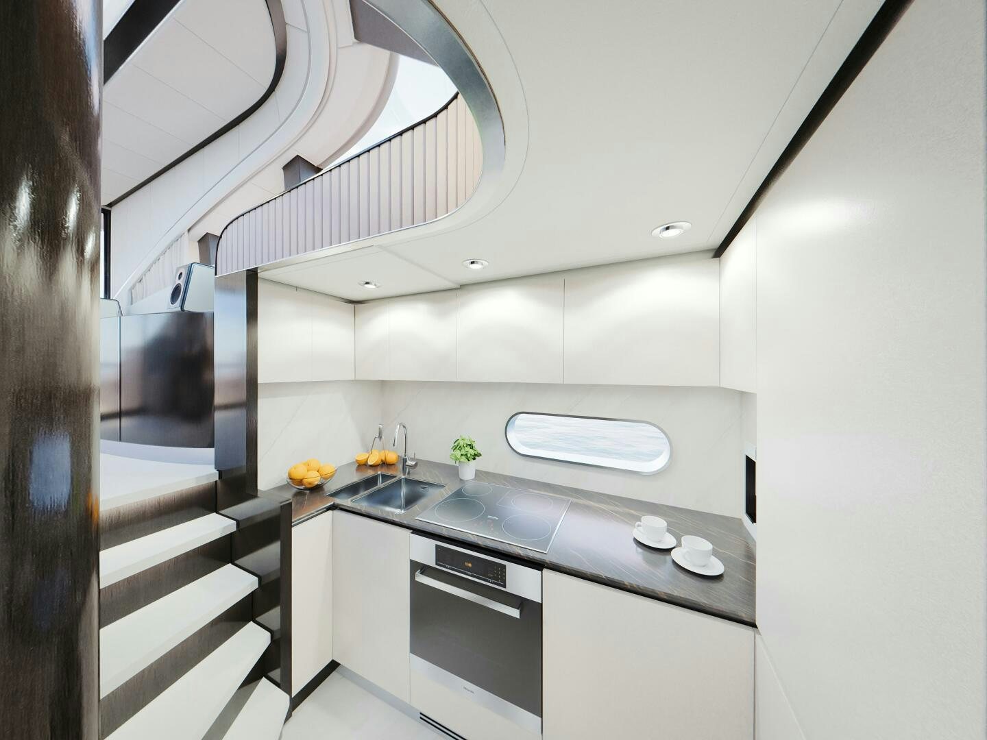 a kitchen with a steel stove aboard CORMORANT Yacht for Sale