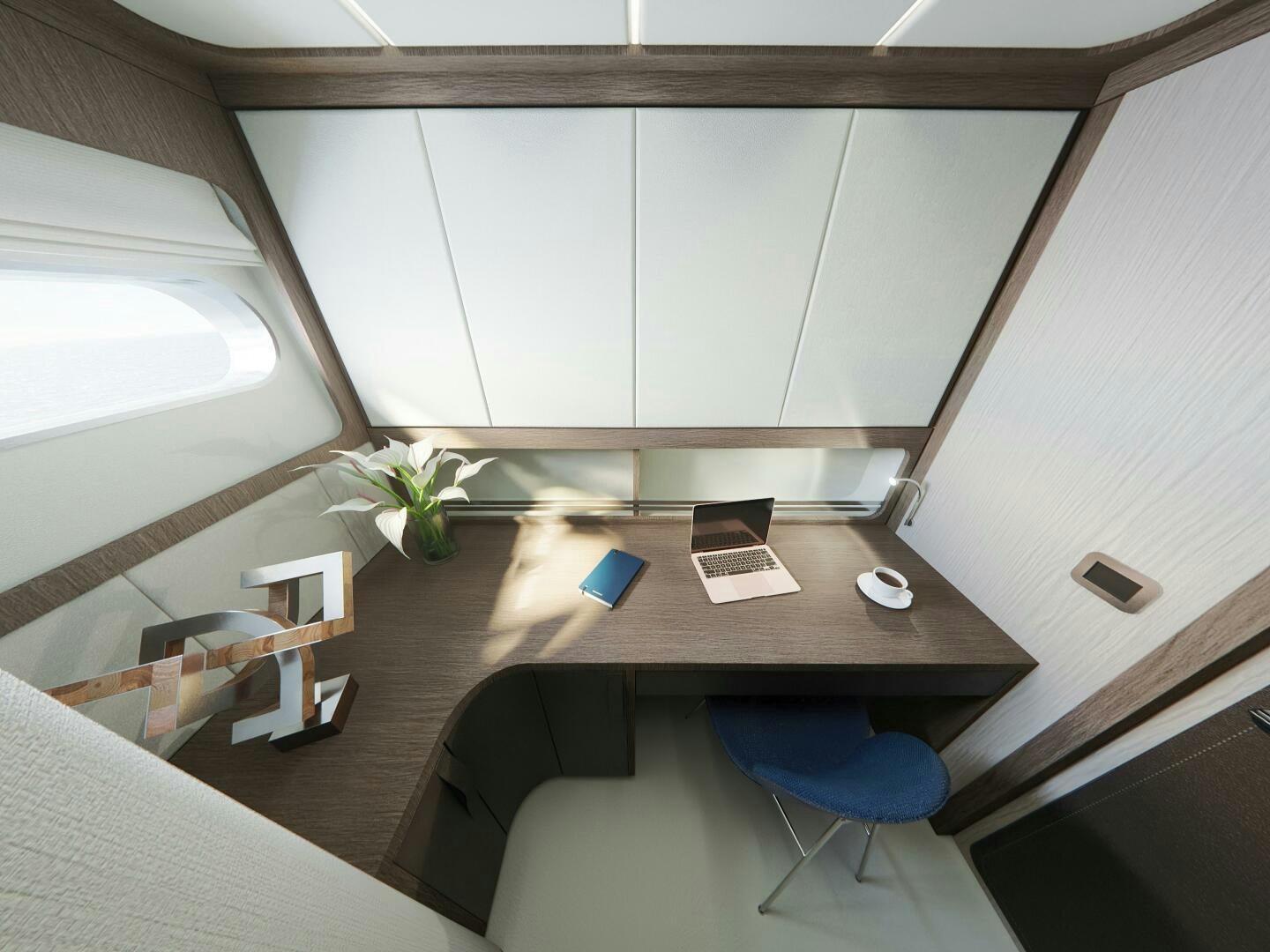 a room with a desk and a chair aboard CORMORANT Yacht for Sale