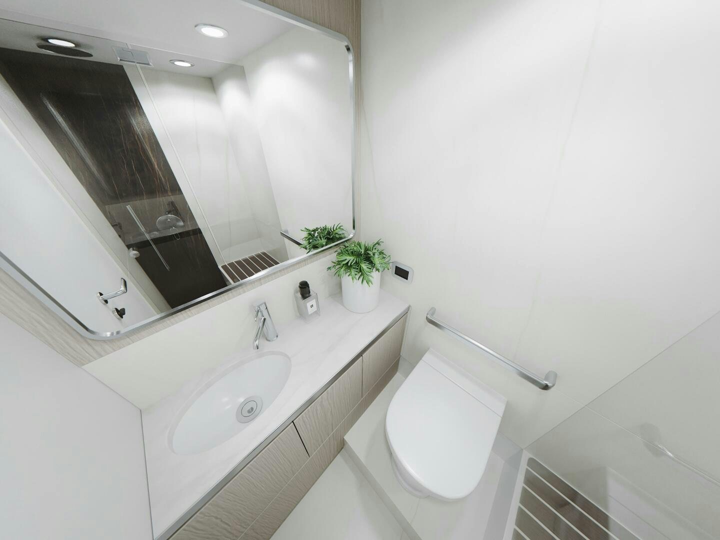 a bathroom with a large mirror aboard CORMORANT Yacht for Sale