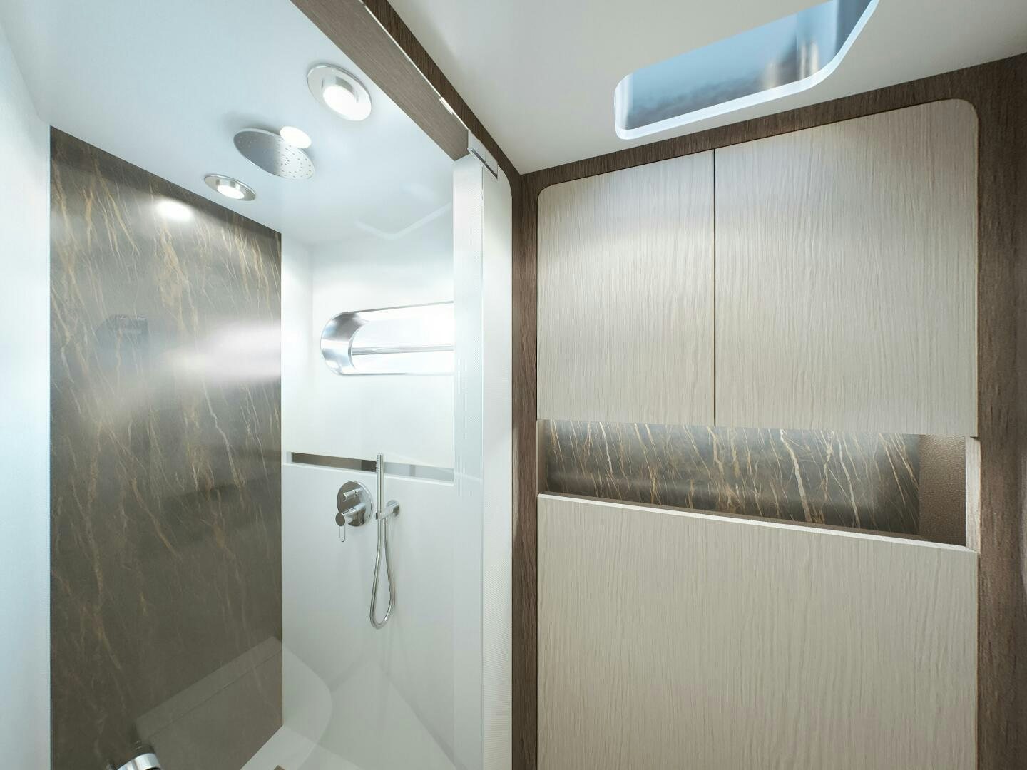 a bathroom with a shower and a sink aboard CORMORANT Yacht for Sale