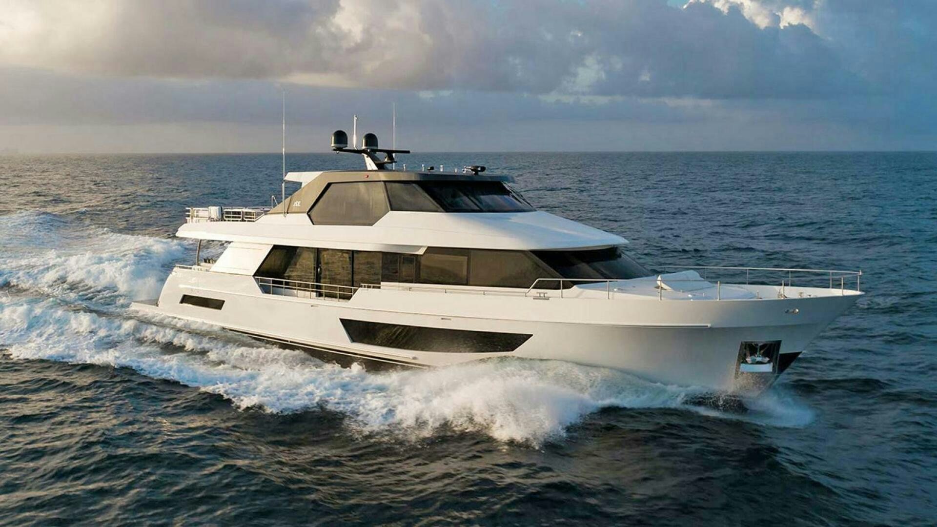 a white yacht on the water aboard DRINKABILITY Yacht for Sale