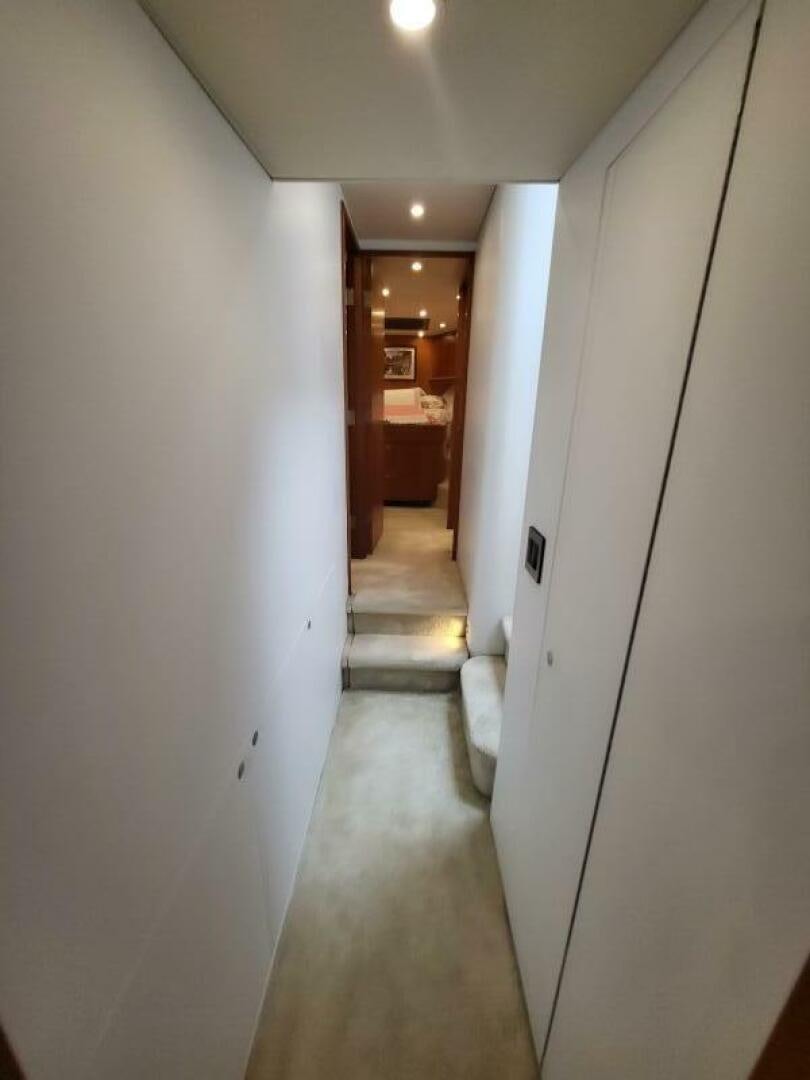 a hallway with a door aboard MAR JON Yacht for Sale
