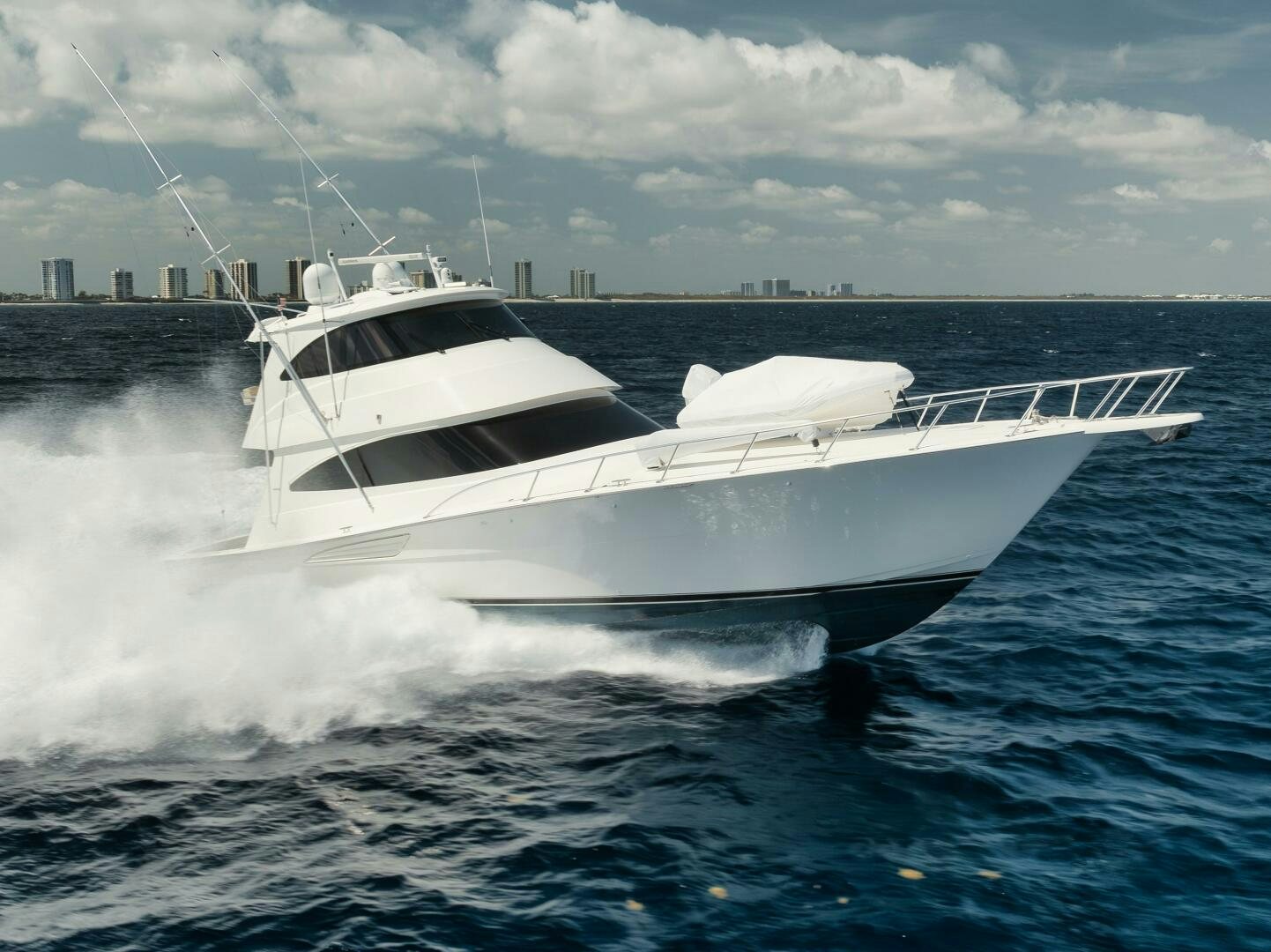 a white yacht on the water aboard DOUBLE SHOT Yacht for Sale