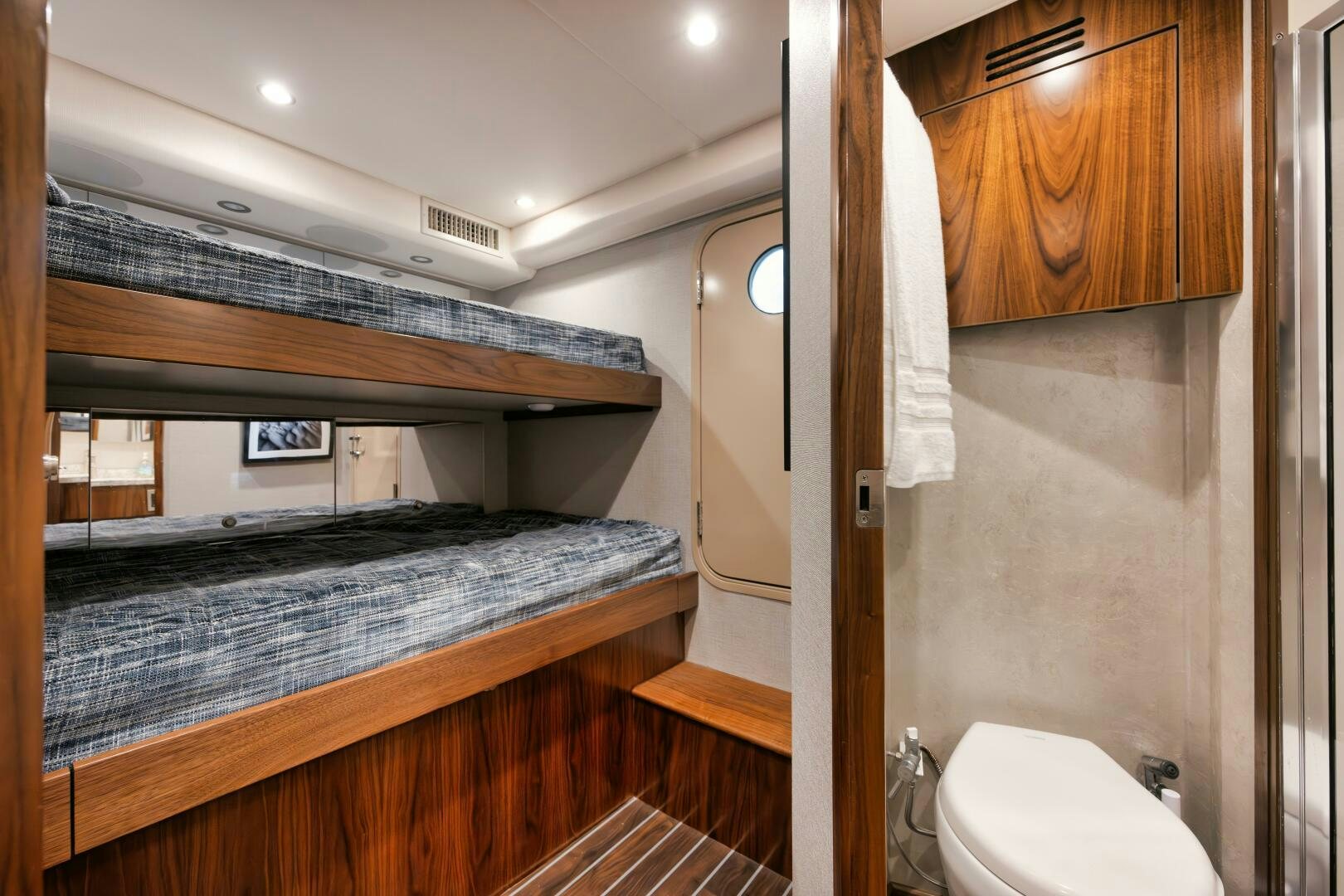 a bathroom with a sink and a toilet aboard DOUBLE SHOT Yacht for Sale