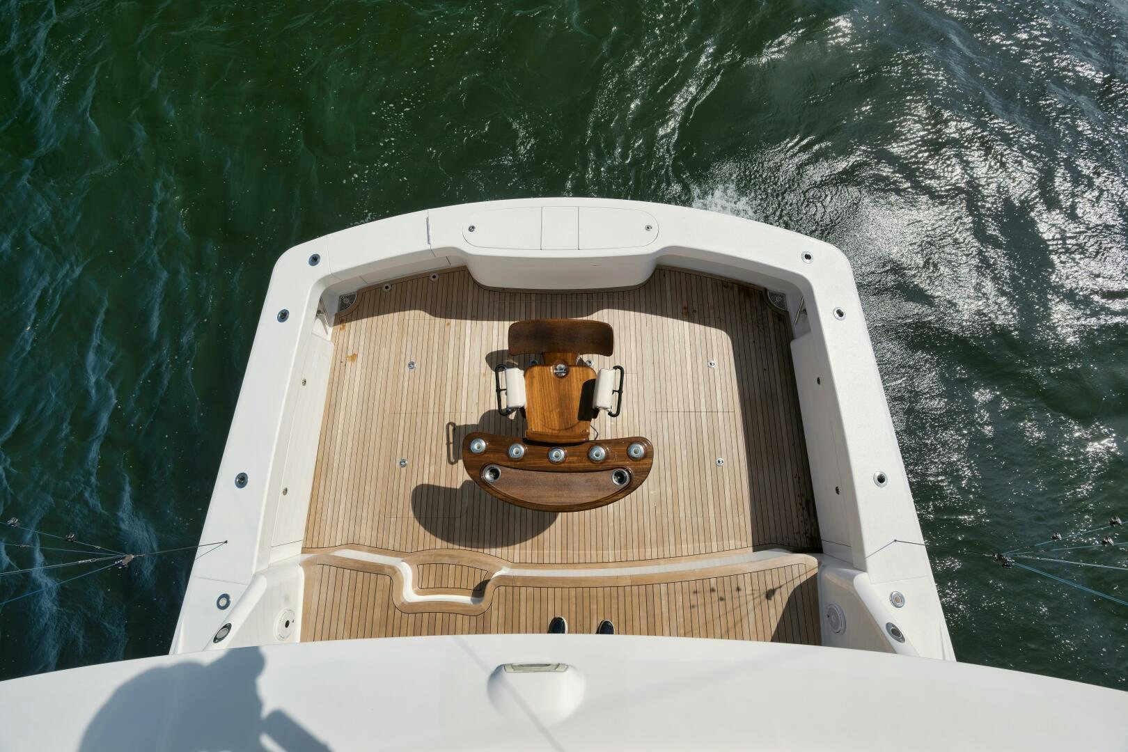 a wooden boat in the water aboard DOUBLE SHOT Yacht for Sale
