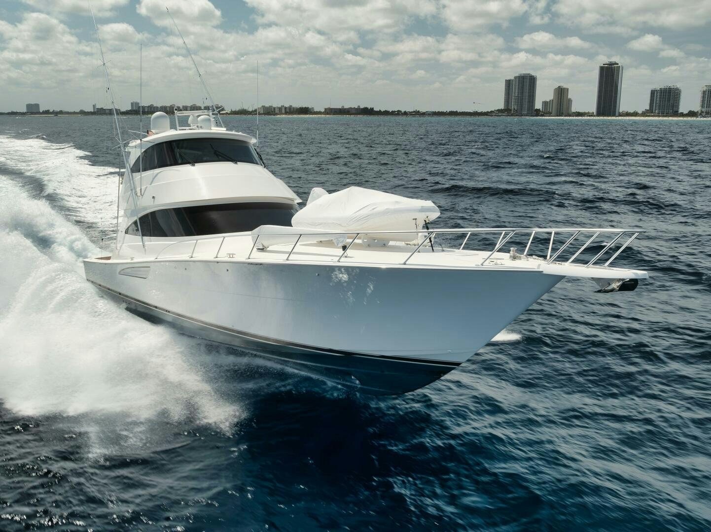 a white yacht on the water aboard DOUBLE SHOT Yacht for Sale