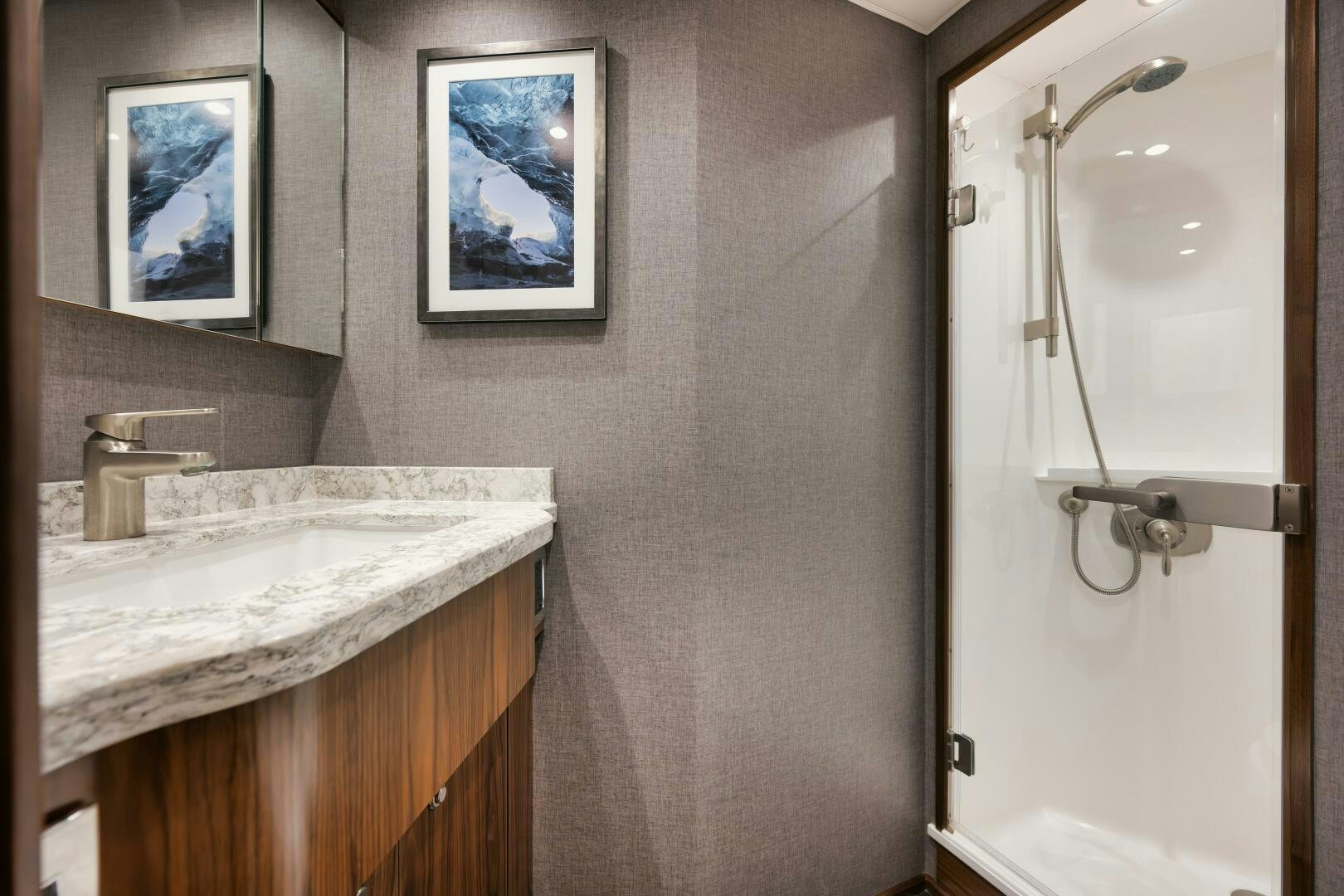 a bathroom with a sink and a mirror aboard DOUBLE SHOT Yacht for Sale