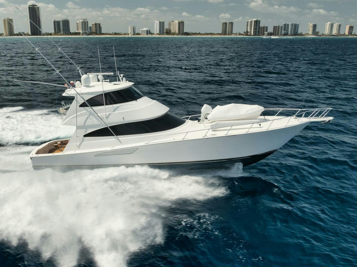 a white boat on the water aboard DOUBLE SHOT Yacht for Sale