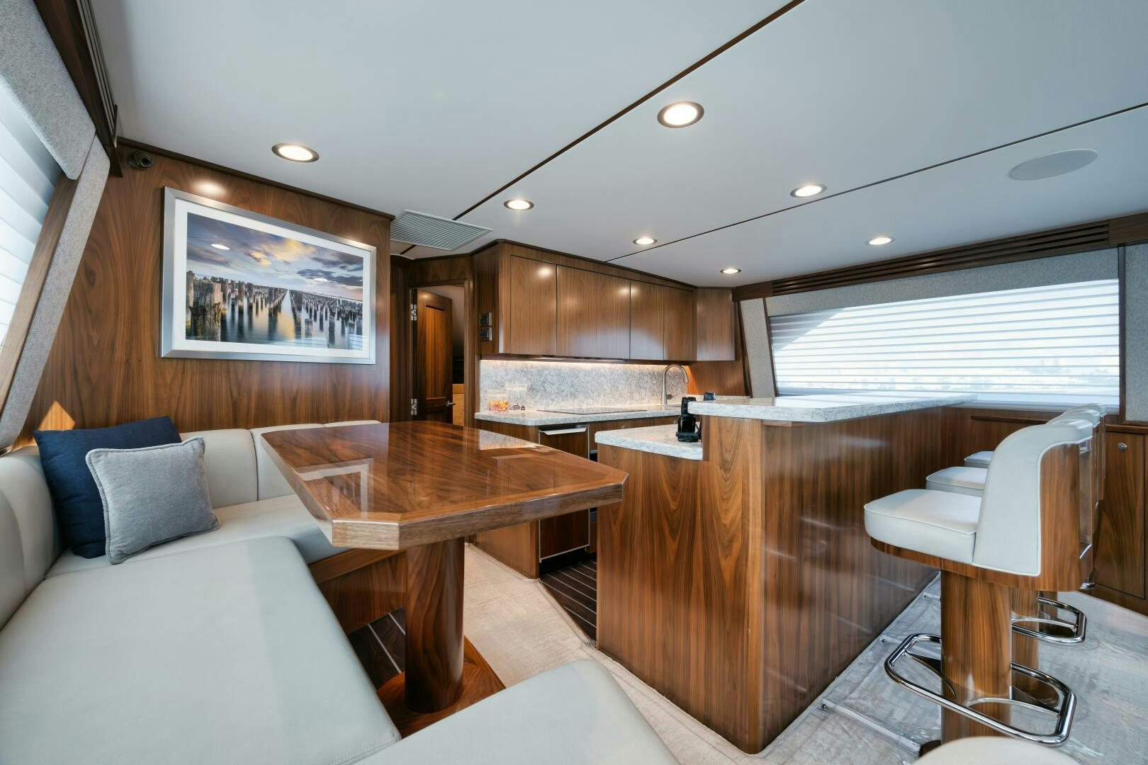 a living room with a couch and a table aboard DOUBLE SHOT Yacht for Sale