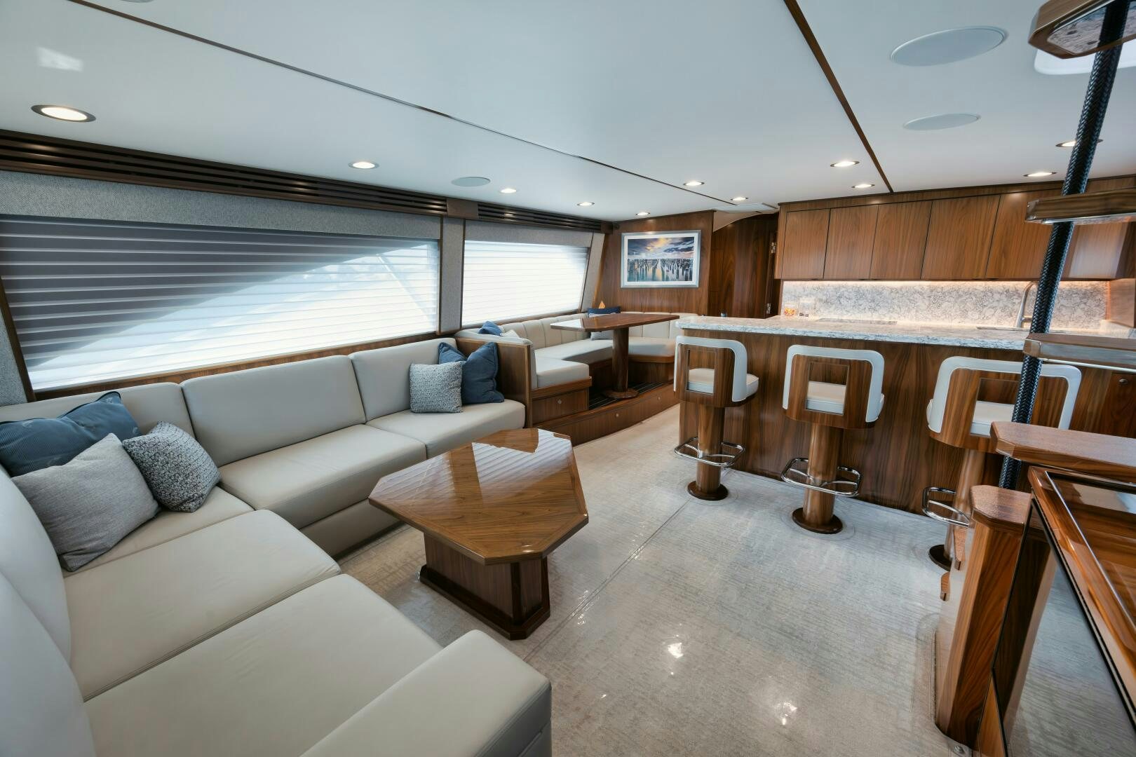 a living room with a large window aboard DOUBLE SHOT Yacht for Sale