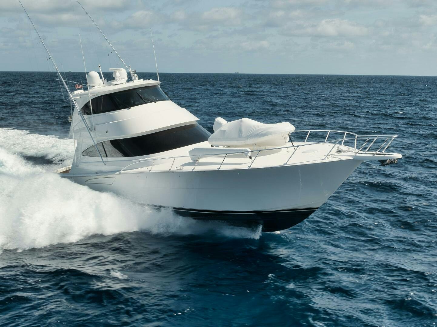 a white yacht on the water aboard DOUBLE SHOT Yacht for Sale