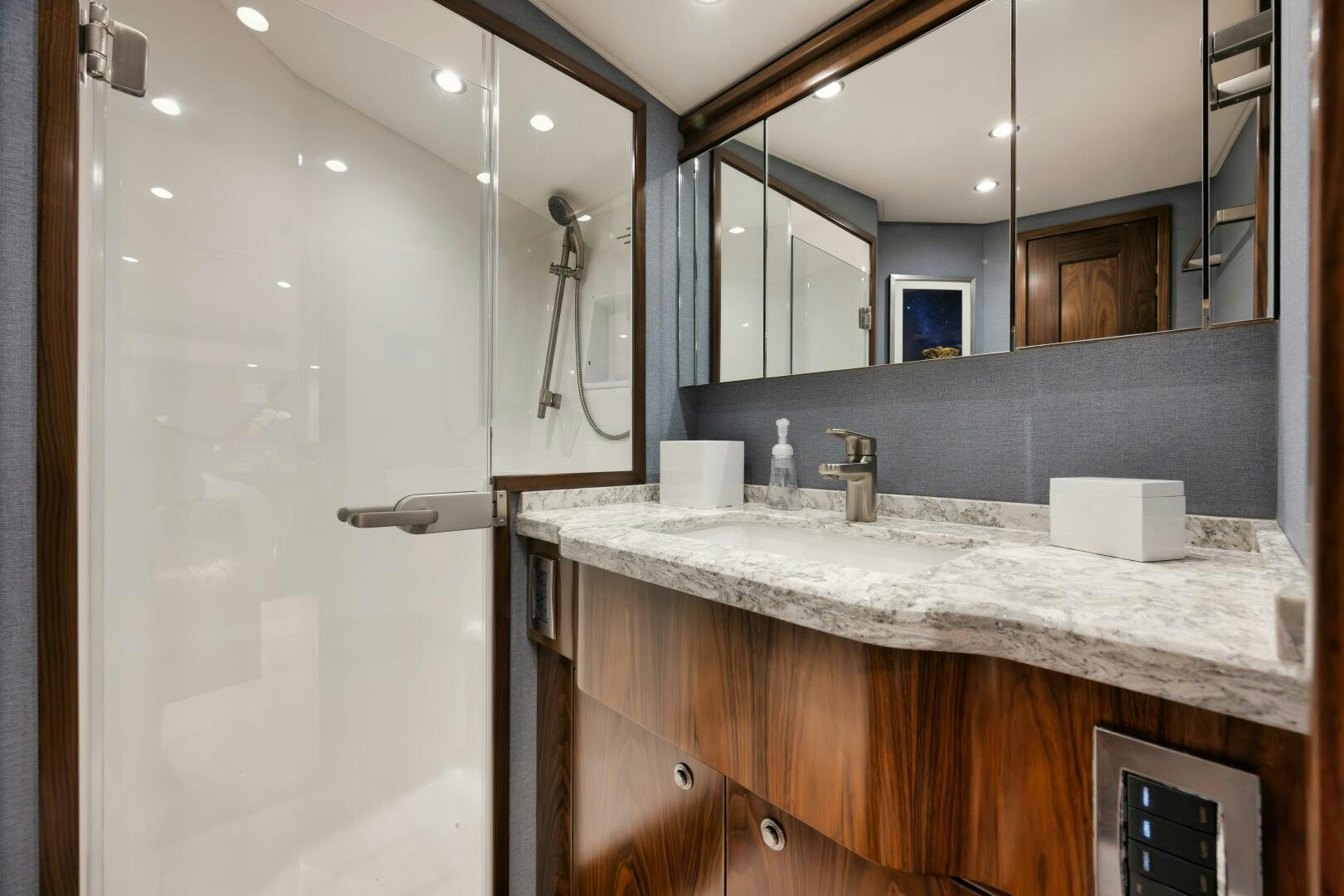 a bathroom with a countertop sink aboard DOUBLE SHOT Yacht for Sale