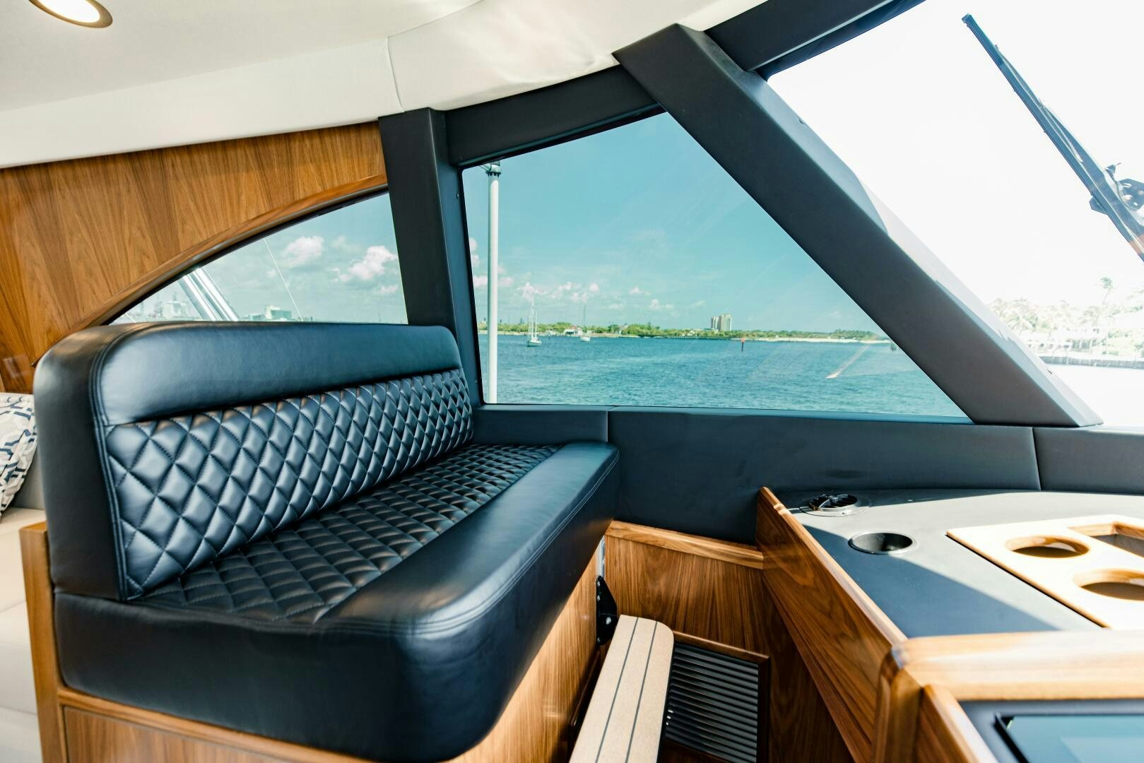 a black seat on a boat aboard DOUBLE SHOT Yacht for Sale