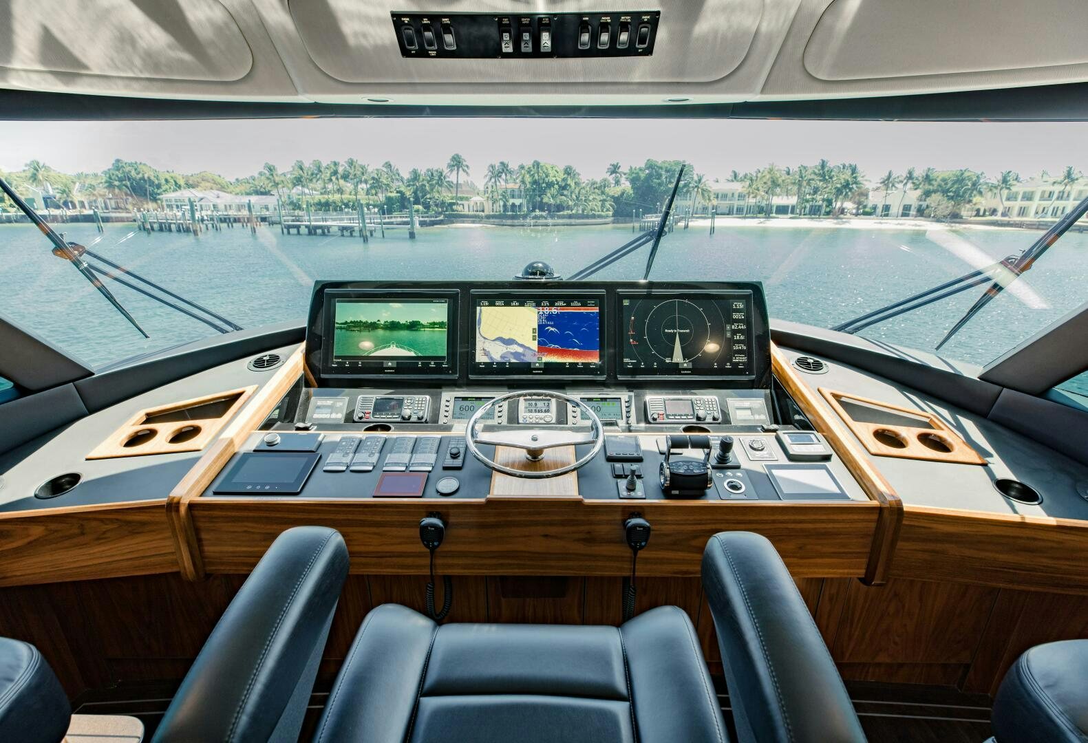 inside of a vehicle with screens aboard DOUBLE SHOT Yacht for Sale