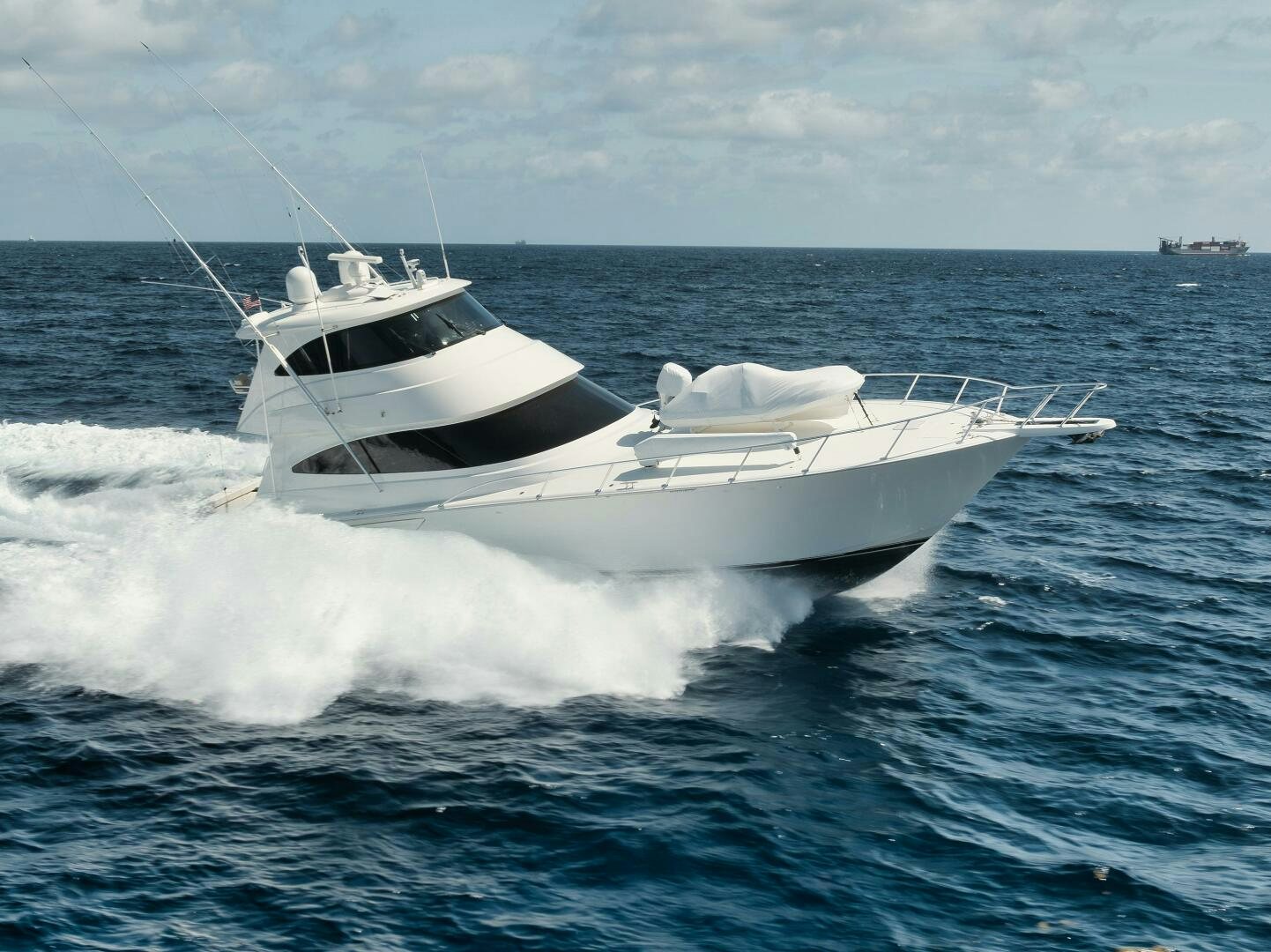 a white yacht on the water aboard DOUBLE SHOT Yacht for Sale