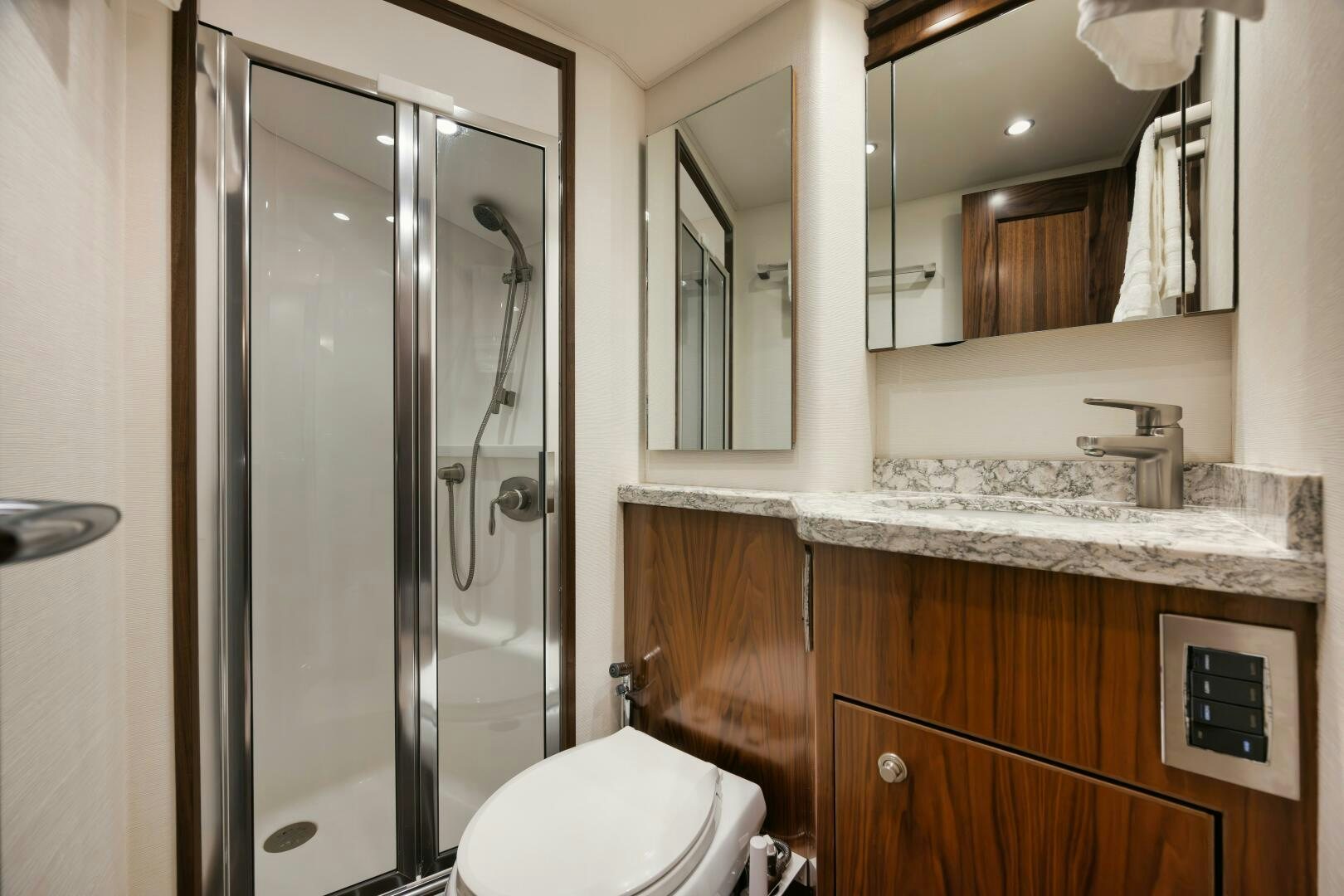 a bathroom with a glass shower aboard DOUBLE SHOT Yacht for Sale