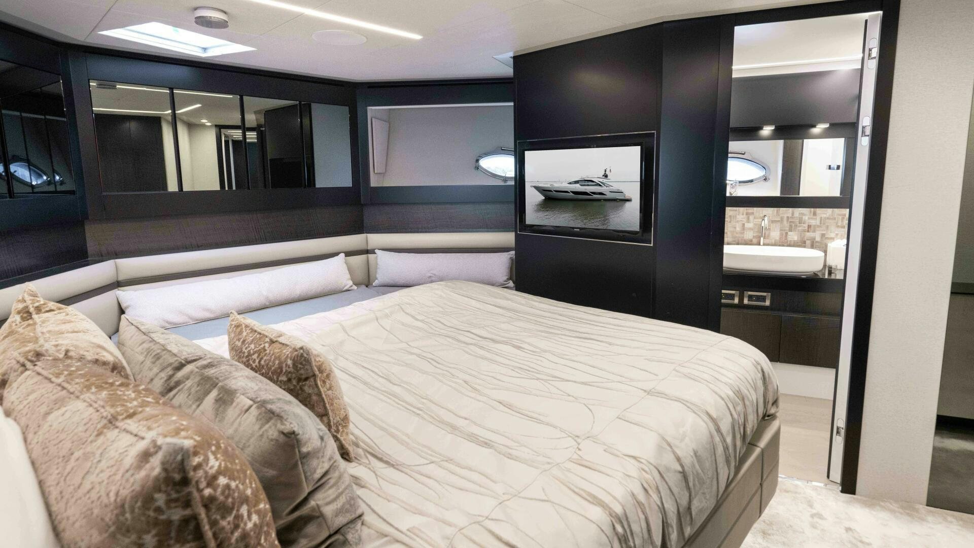 a bed in a room aboard STALLION Yacht for Sale