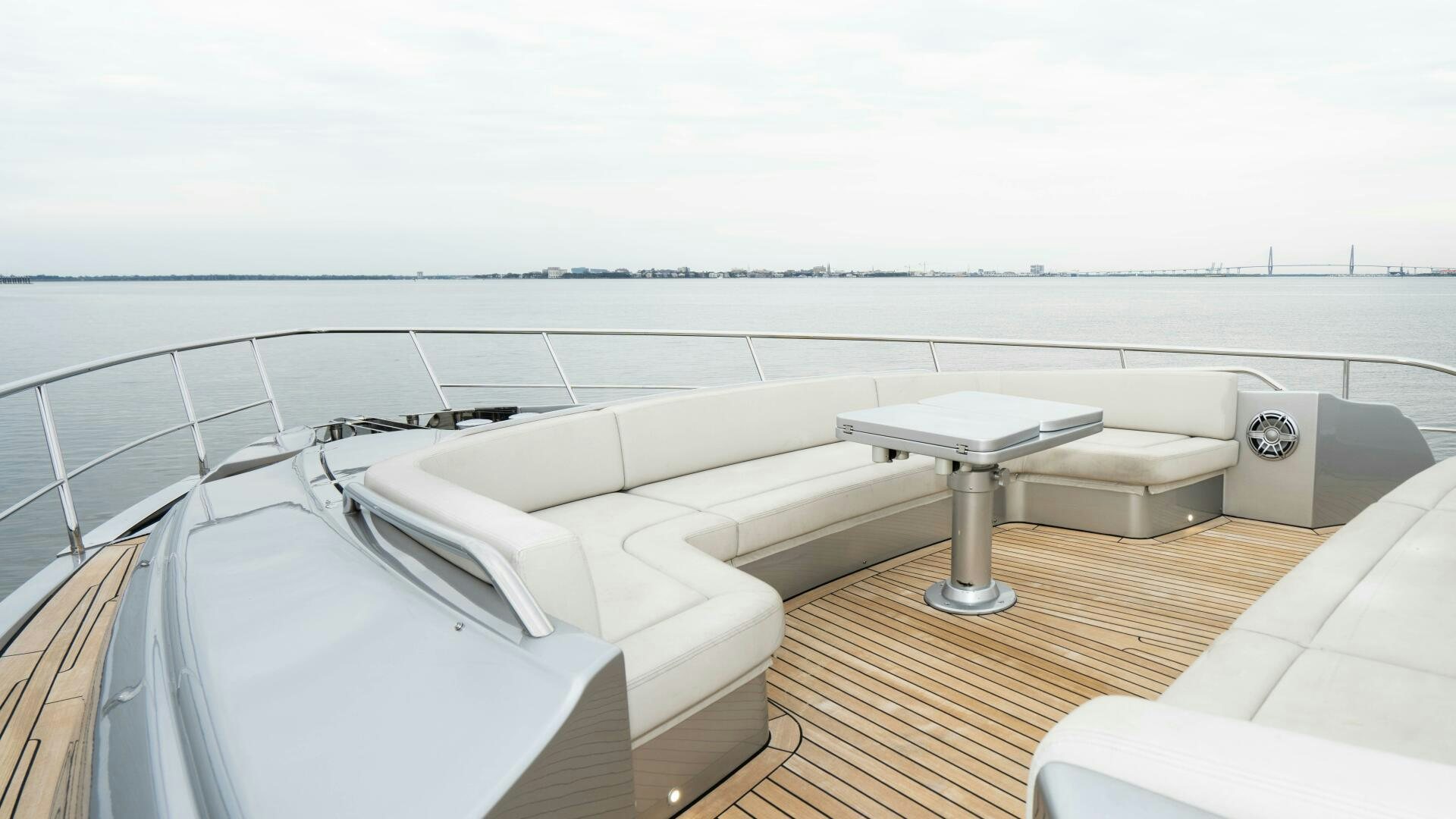 a white couch on a deck aboard STALLION Yacht for Sale