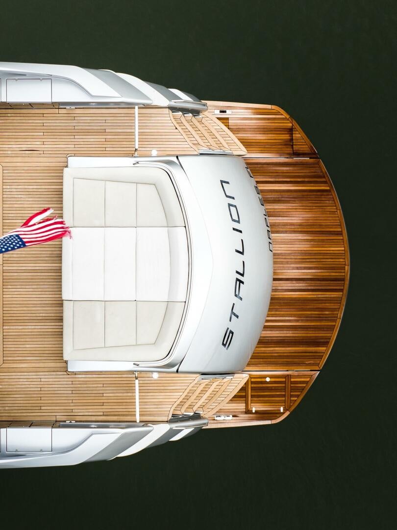 a white object with a red and black flag on it aboard STALLION Yacht for Sale