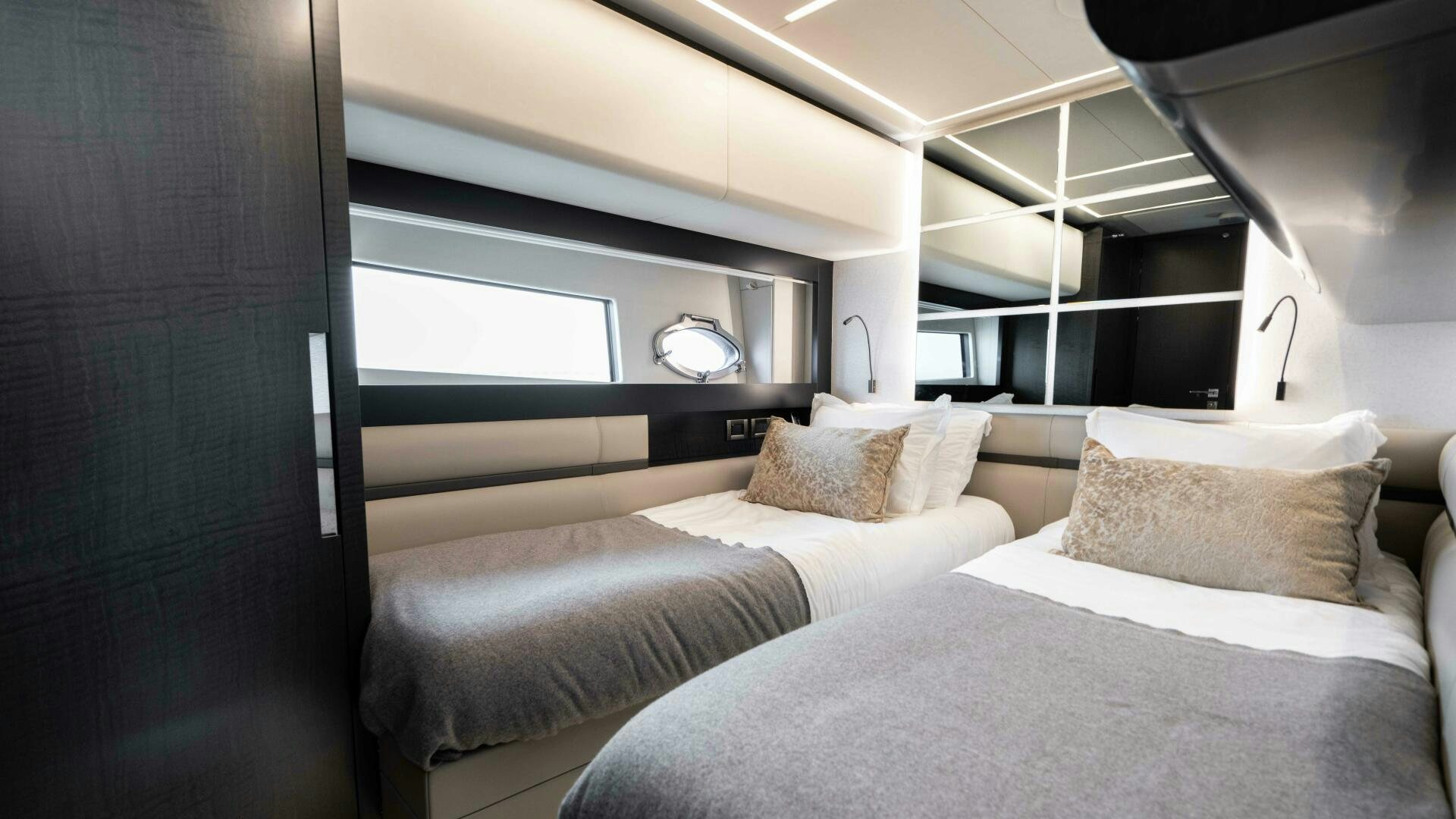 a room with two beds aboard STALLION Yacht for Sale