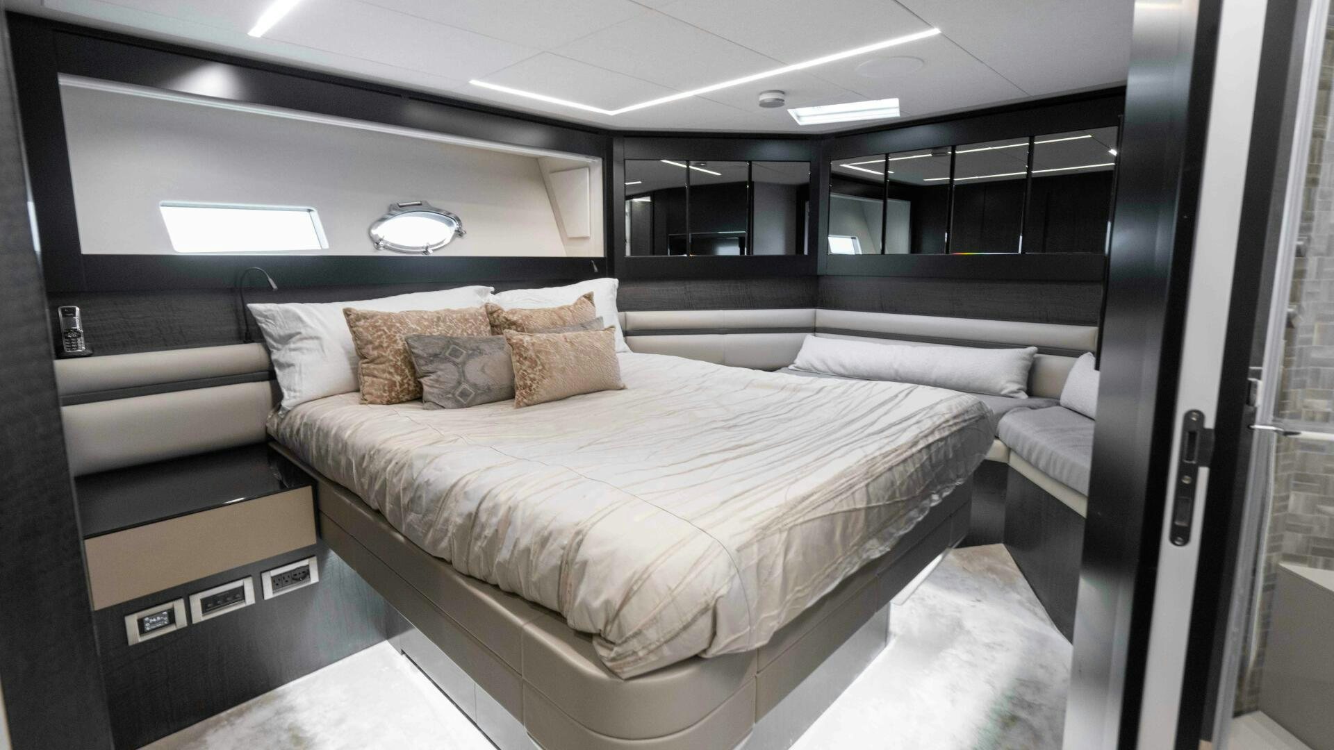 a bed in a room aboard STALLION Yacht for Sale