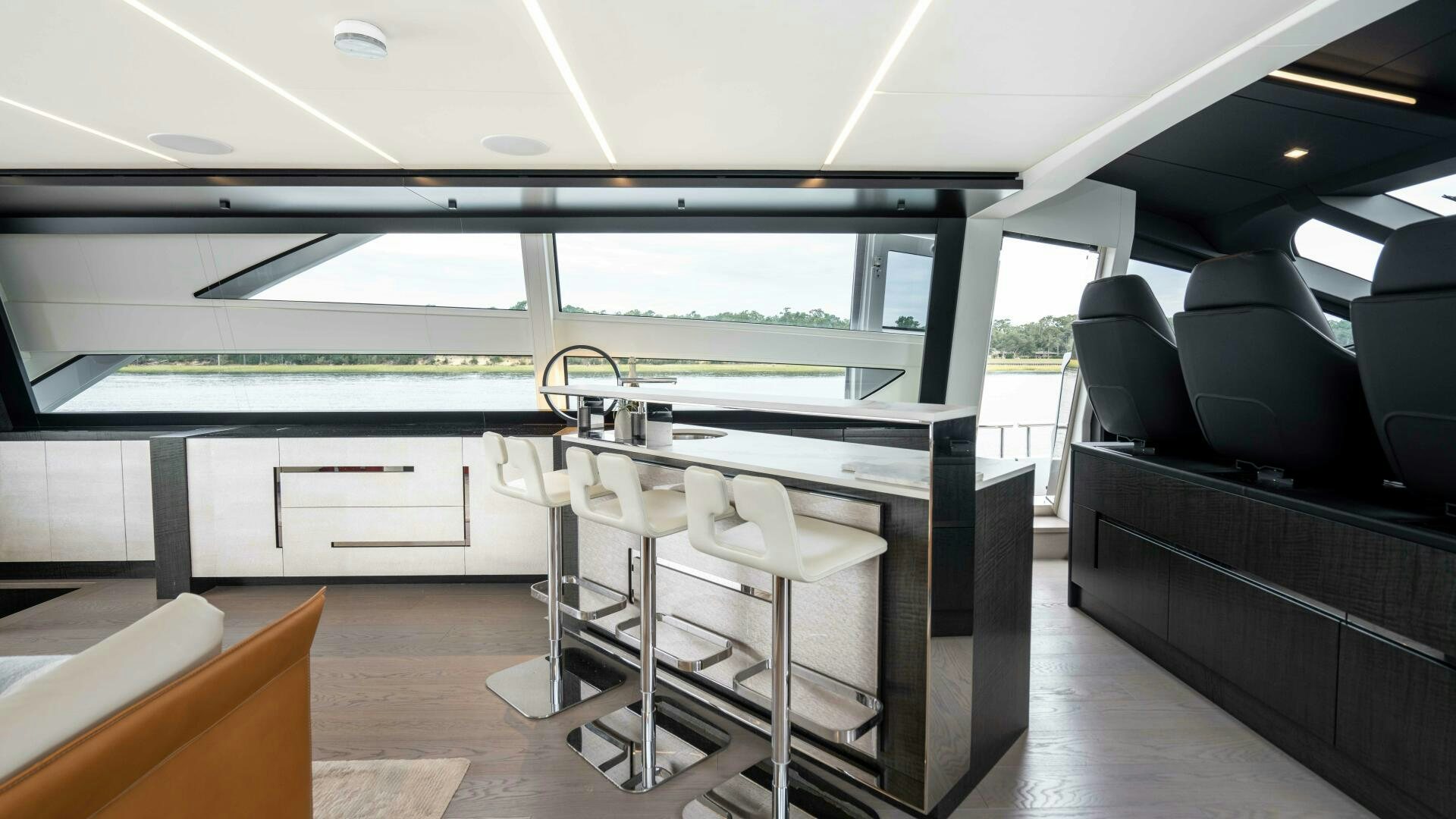 inside of a building with chairs and tables aboard STALLION Yacht for Sale