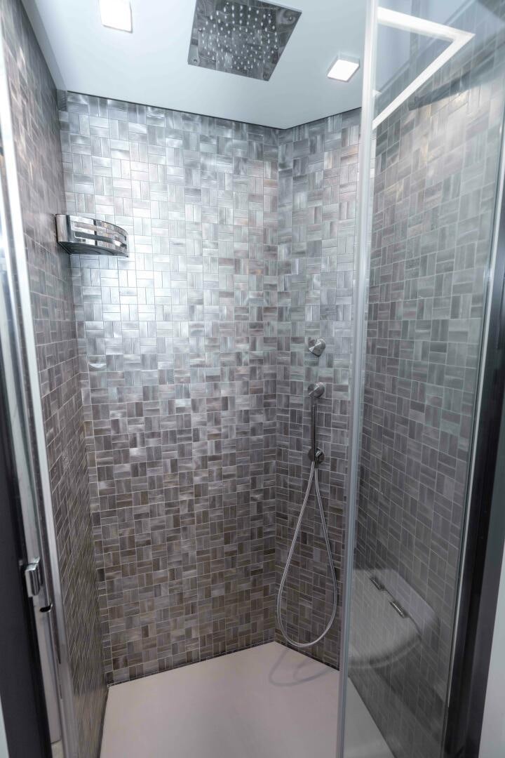 a shower with a glass door aboard STALLION Yacht for Sale