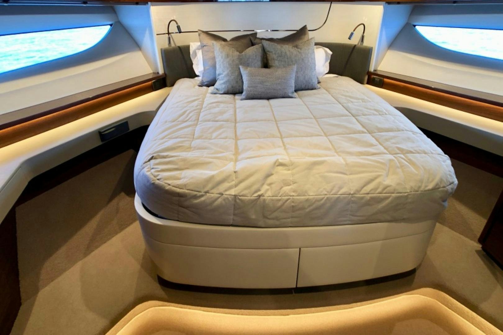 a bed with white sheets aboard THE O SHEAUX Yacht for Sale