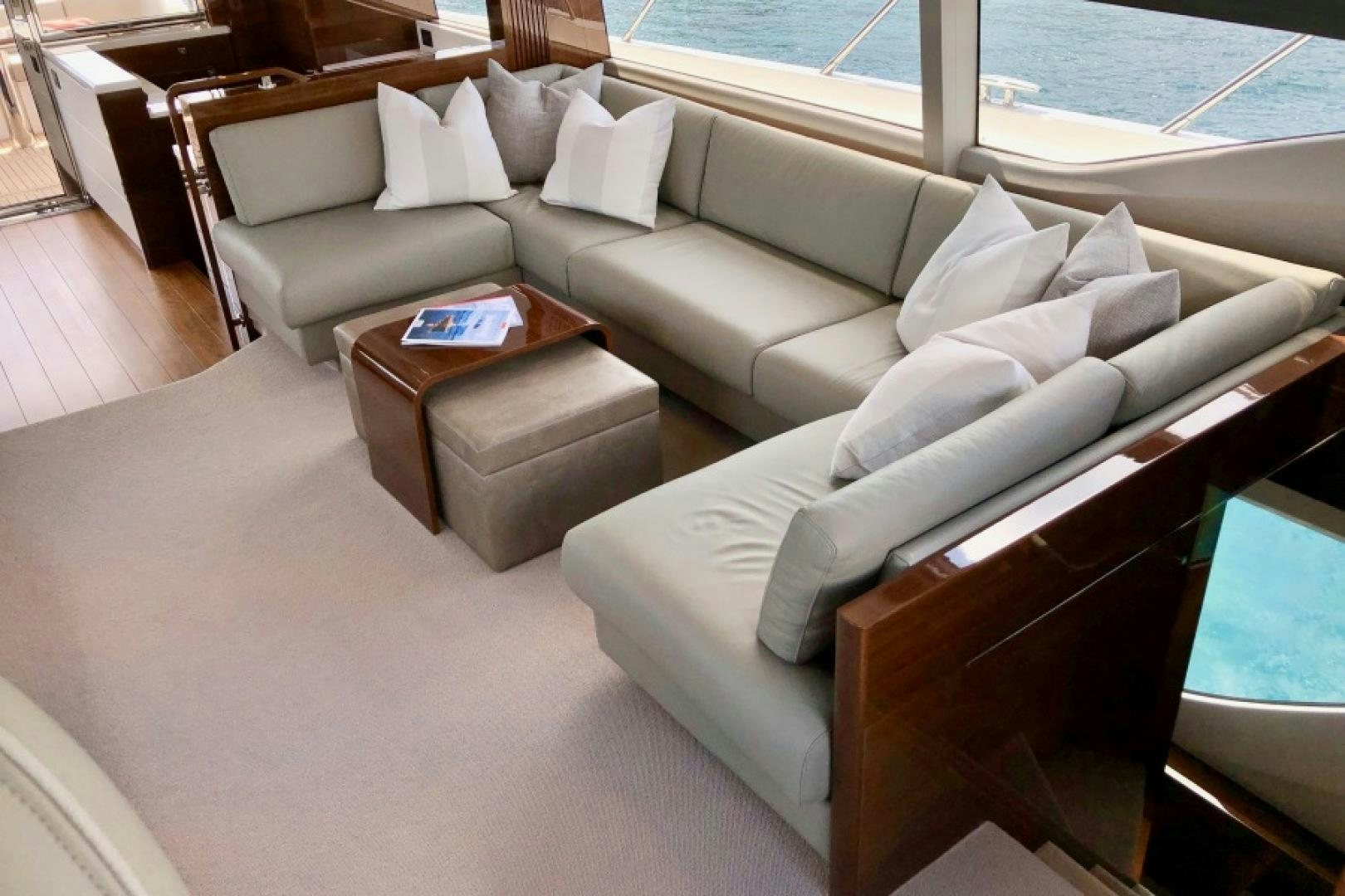 a living room with a couch and a table aboard THE O SHEAUX Yacht for Sale