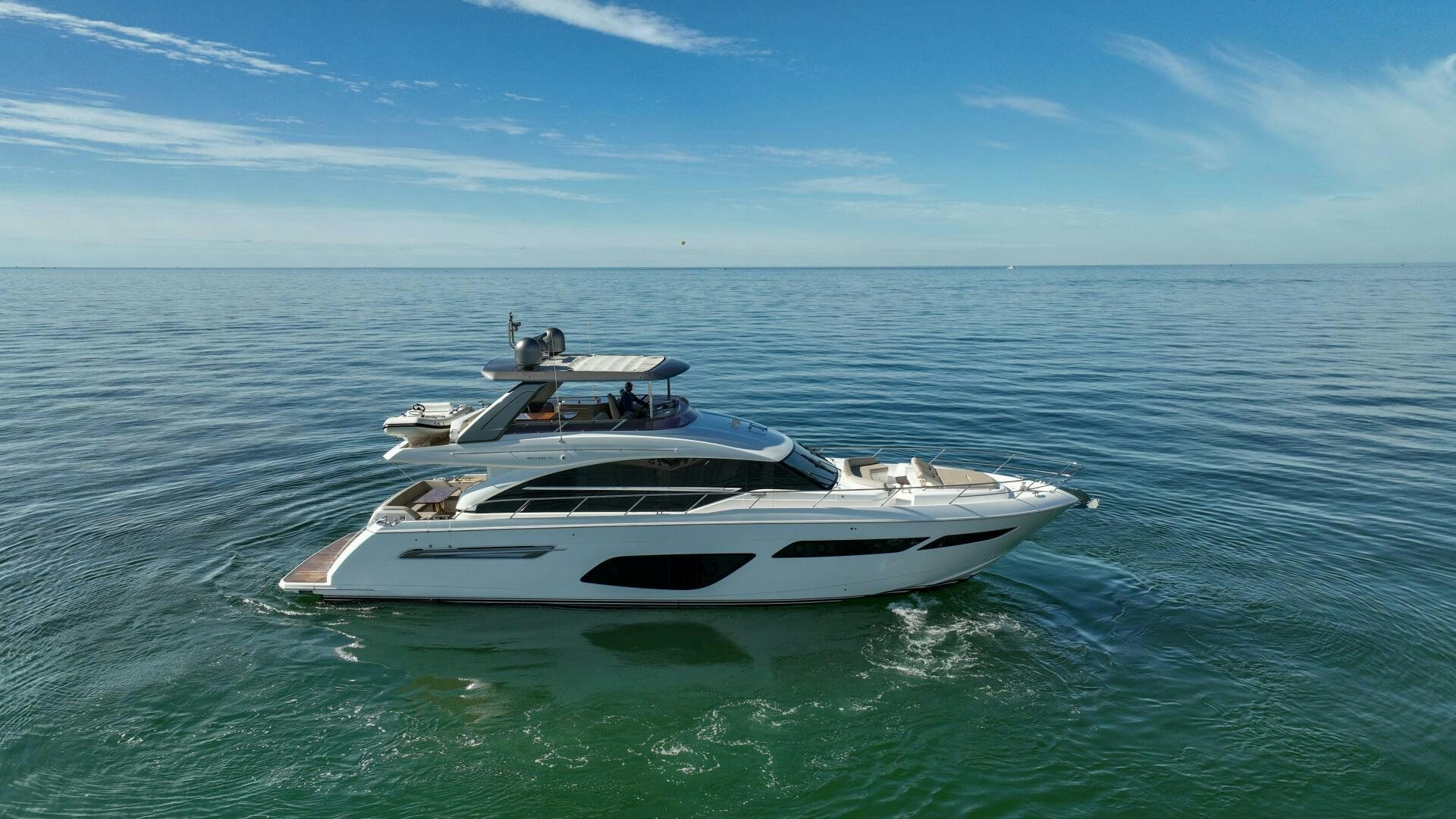 a white boat in the water aboard THE O SHEAUX Yacht for Sale
