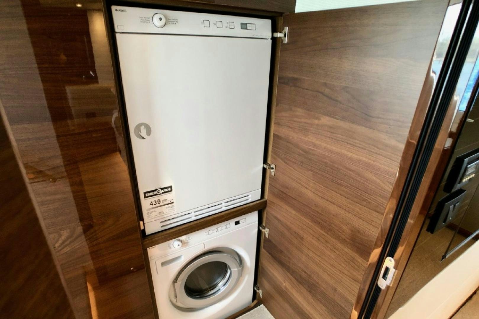 a white washing machine aboard THE O SHEAUX Yacht for Sale