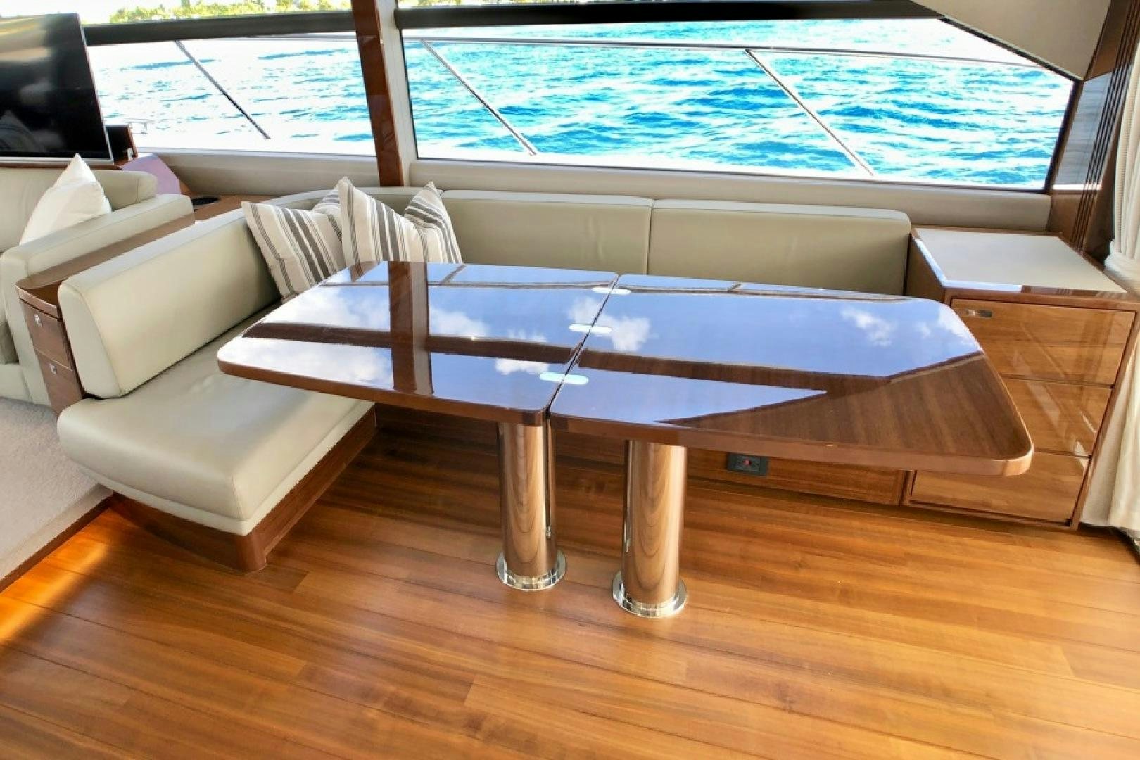 a table with a bench aboard THE O SHEAUX Yacht for Sale