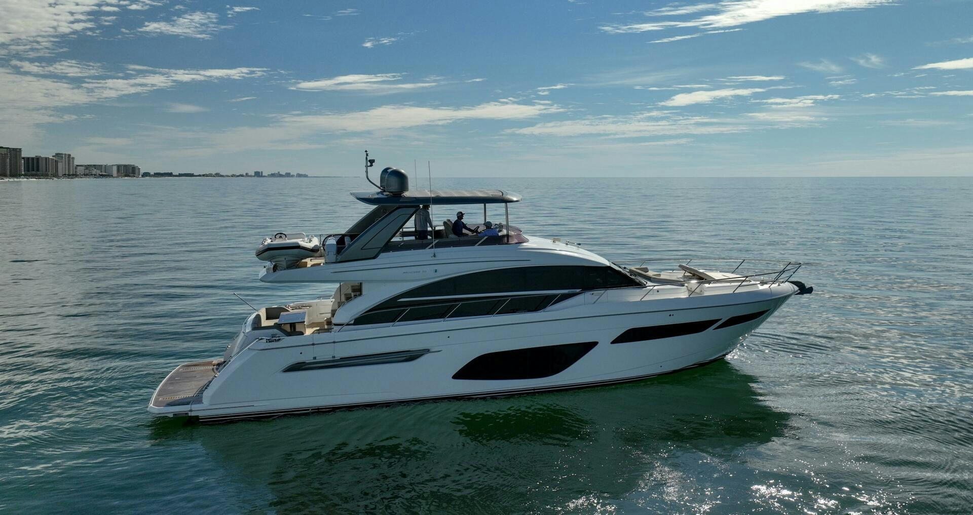 a white boat on the water aboard THE O SHEAUX Yacht for Sale