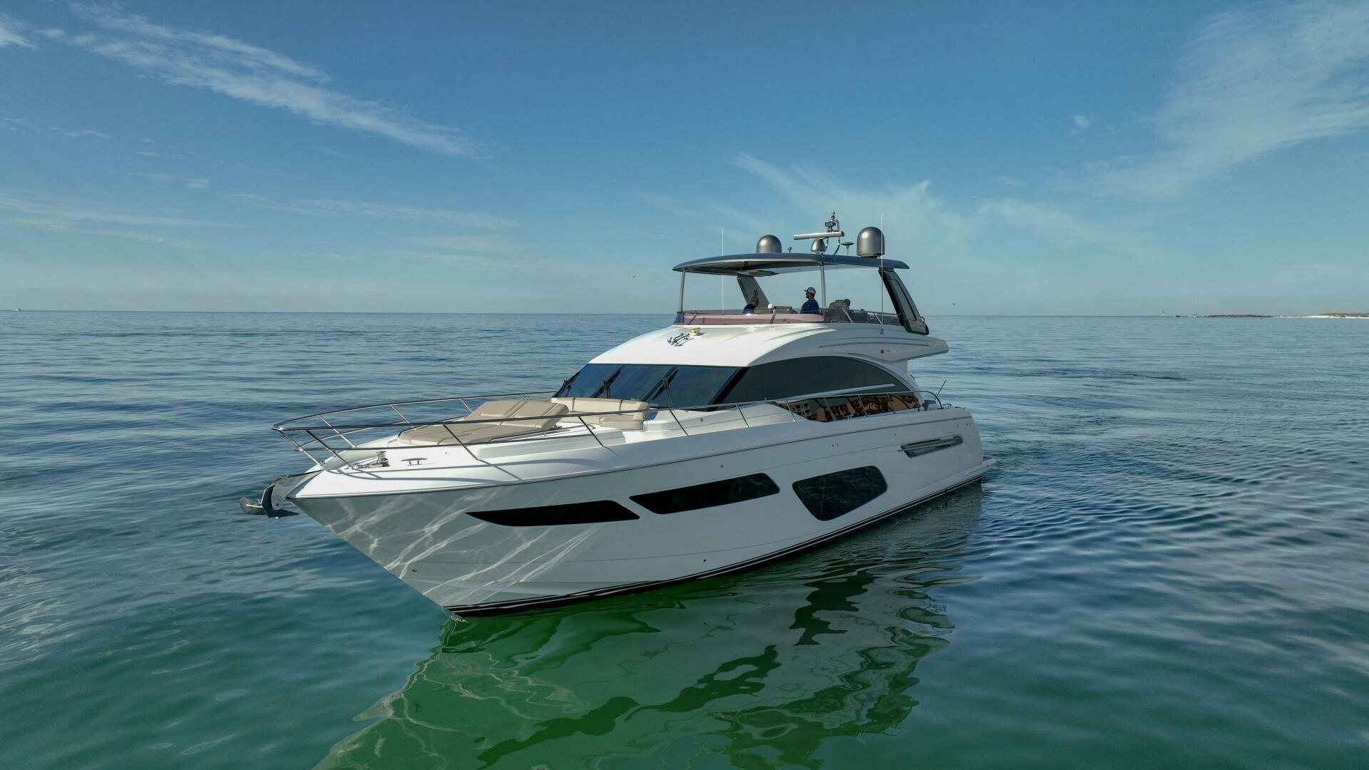 a white boat in the water aboard THE O SHEAUX Yacht for Sale
