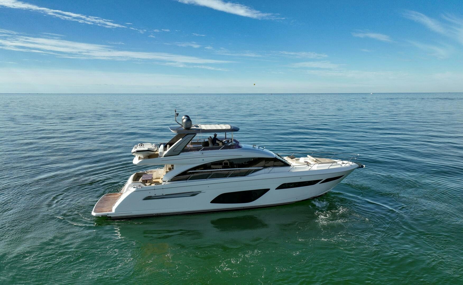 a white boat in the water aboard THE O SHEAUX Yacht for Sale