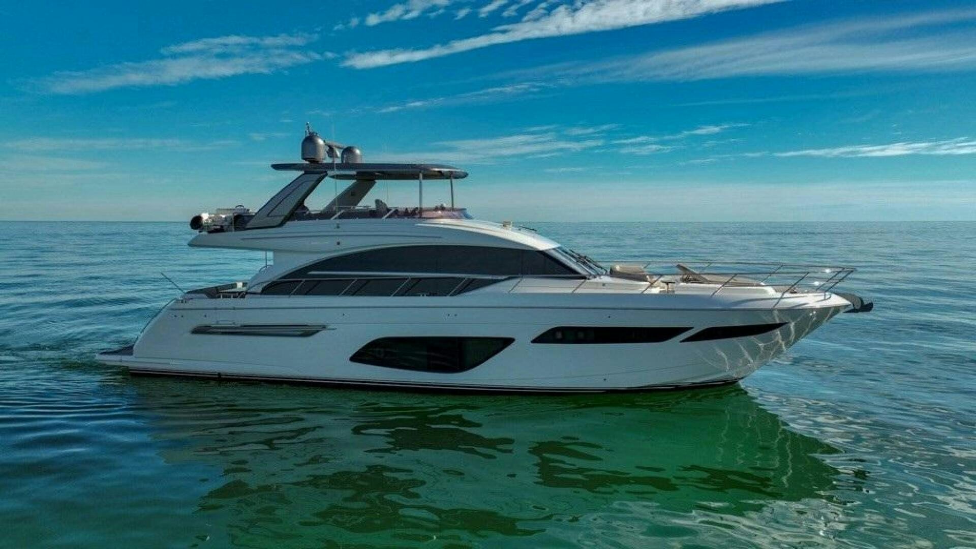 a white yacht in the water aboard THE O SHEAUX Yacht for Sale