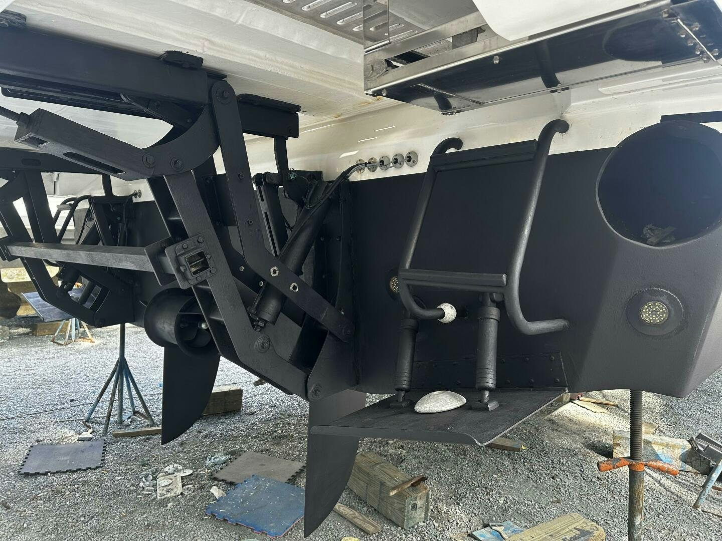 a car with a large engine aboard THE O SHEAUX Yacht for Sale