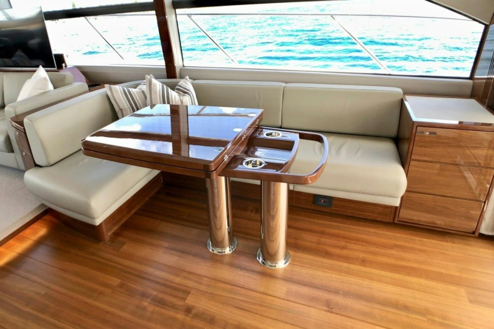 a table and chairs in a room aboard THE O SHEAUX Yacht for Sale