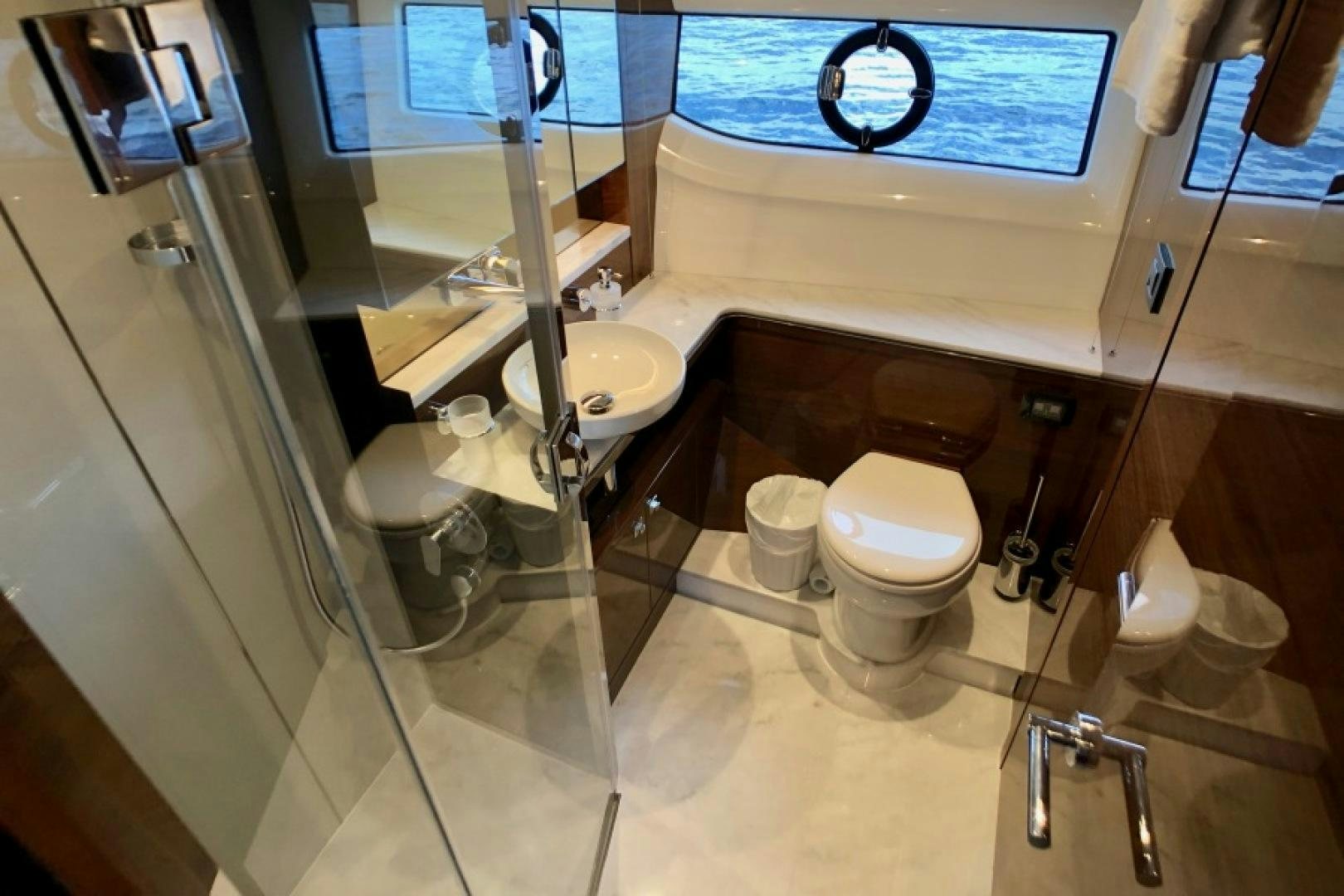 a bathroom with a glass shower aboard THE O SHEAUX Yacht for Sale