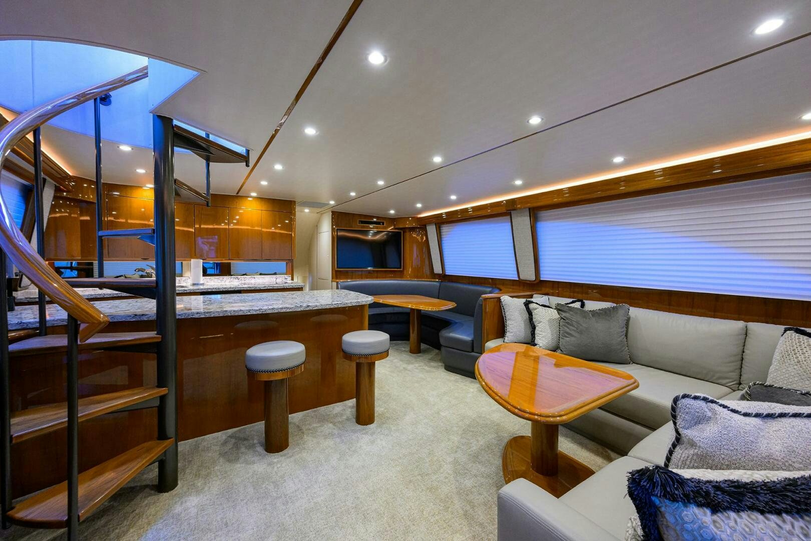 a room with a couch and a piano aboard TORTA Yacht for Sale