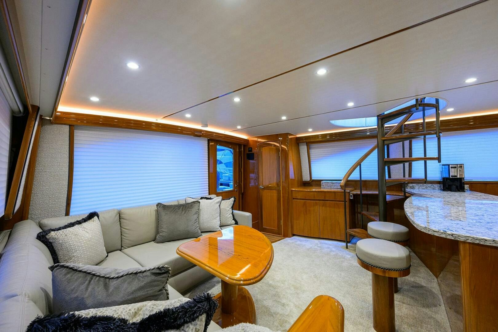 a living room with a large window aboard TORTA Yacht for Sale