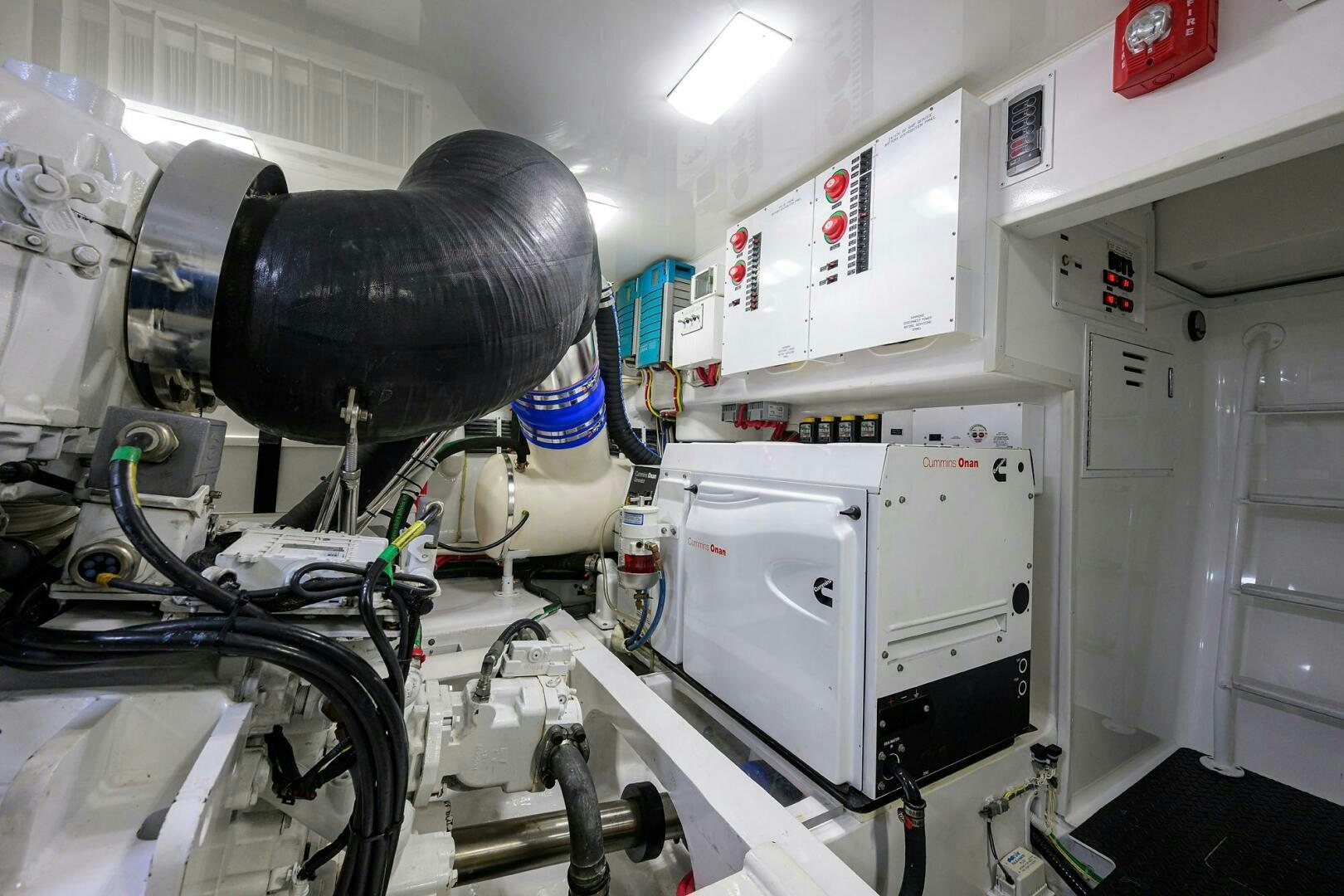 a large machine in a room aboard TORTA Yacht for Sale