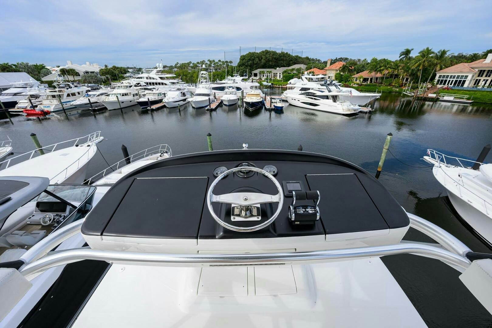 a car parked in a harbor aboard TORTA Yacht for Sale